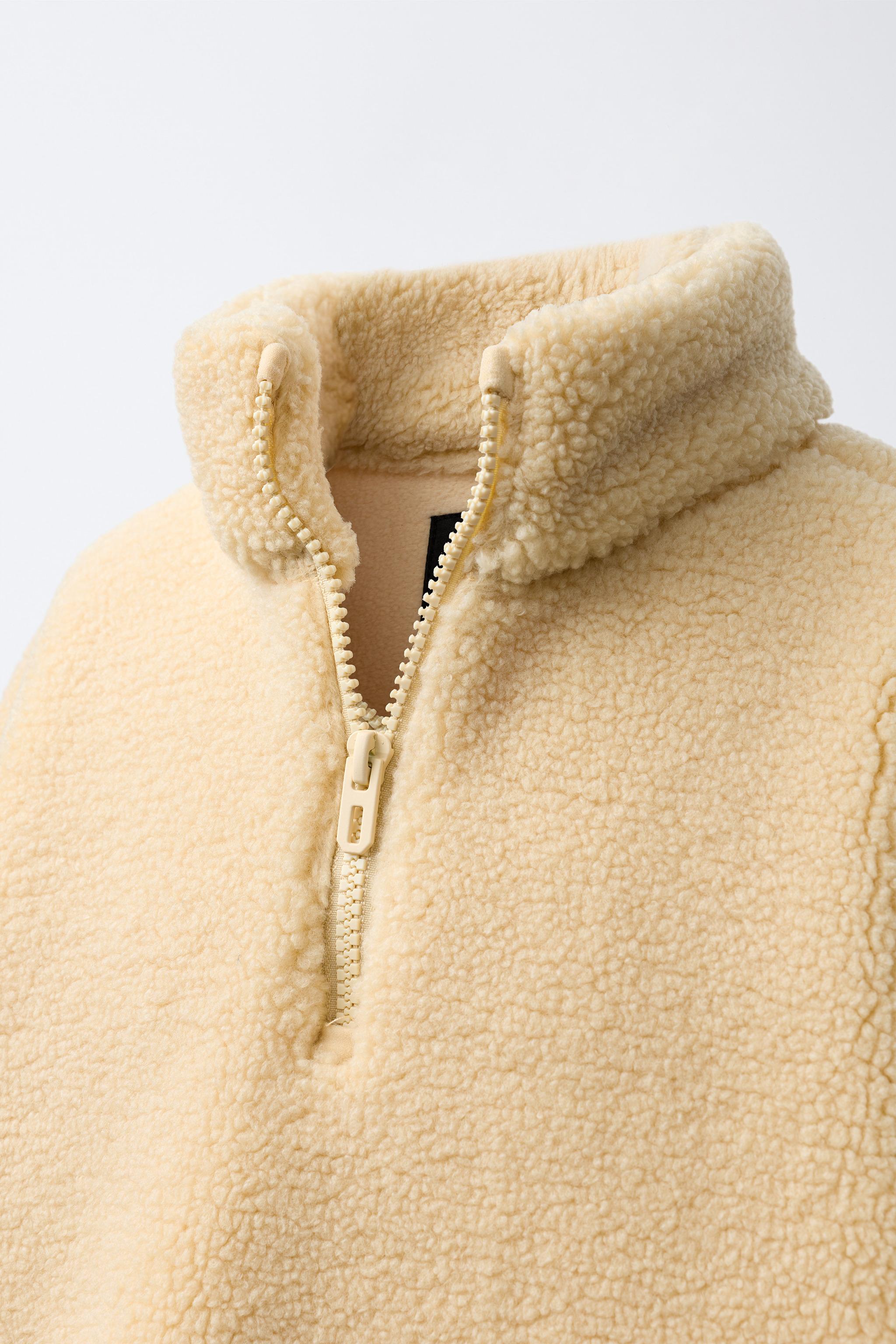 ZIP FAUX SHEARLING SWEATSHIRT