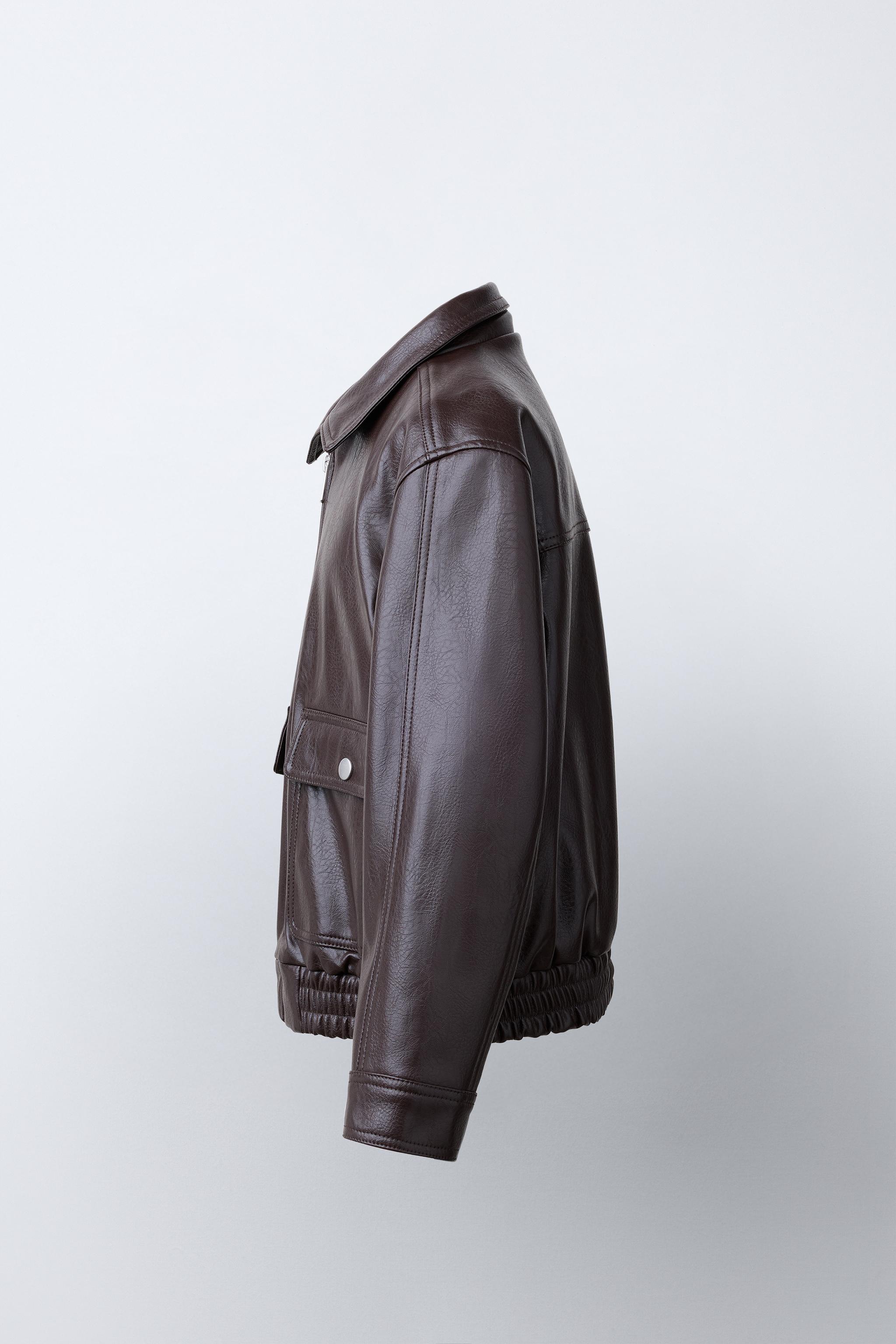 BLOUSON EN MATIÈRE SYNTHÉTIQUE À POCHES
