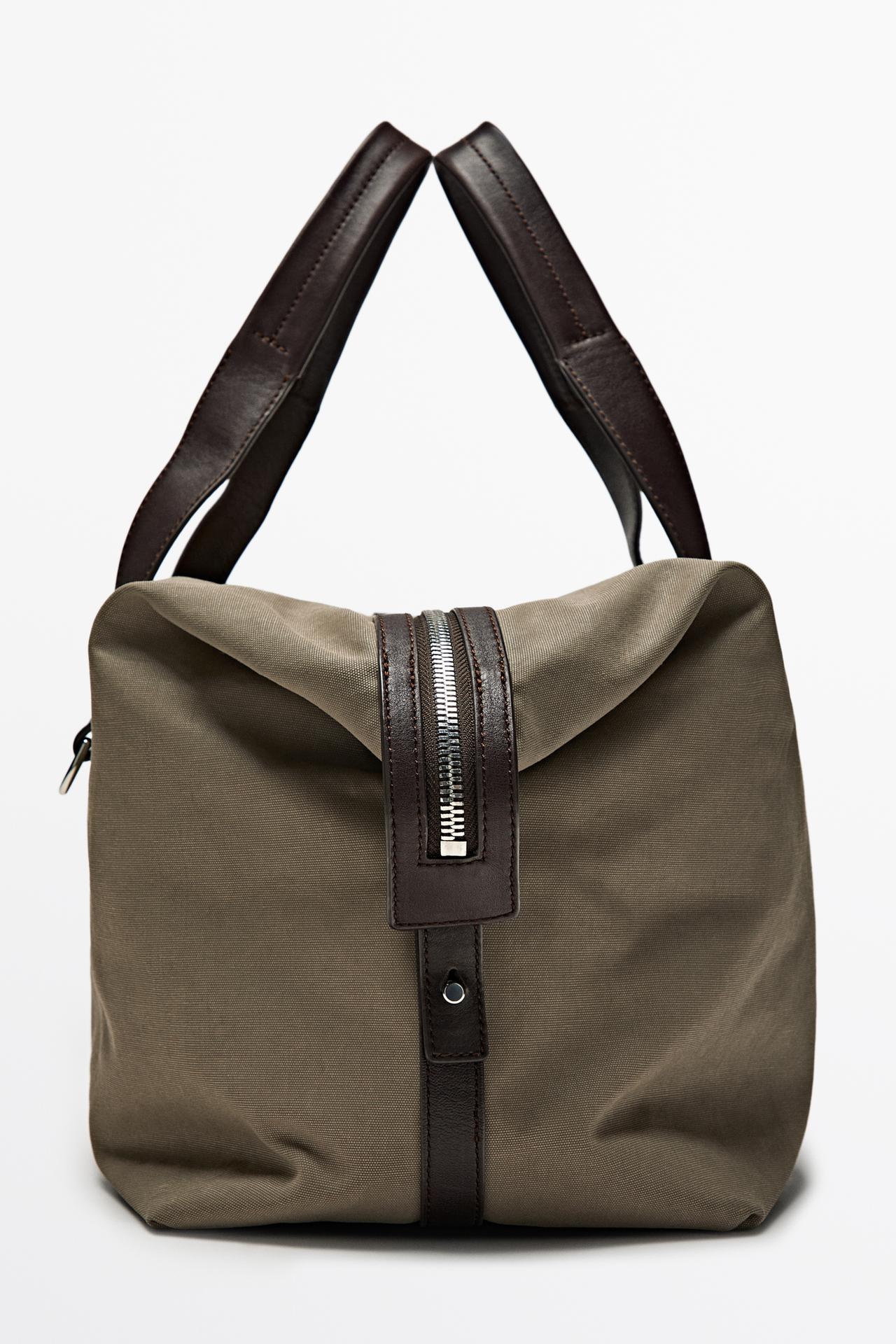 Nappa leather detail travel bag — Black gold