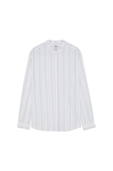Front view of a white and blue striped shirt with a round neck and central button fastening.