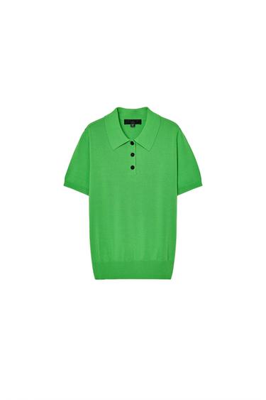 Front view of a green polo shirt with a black collar and button fastening.