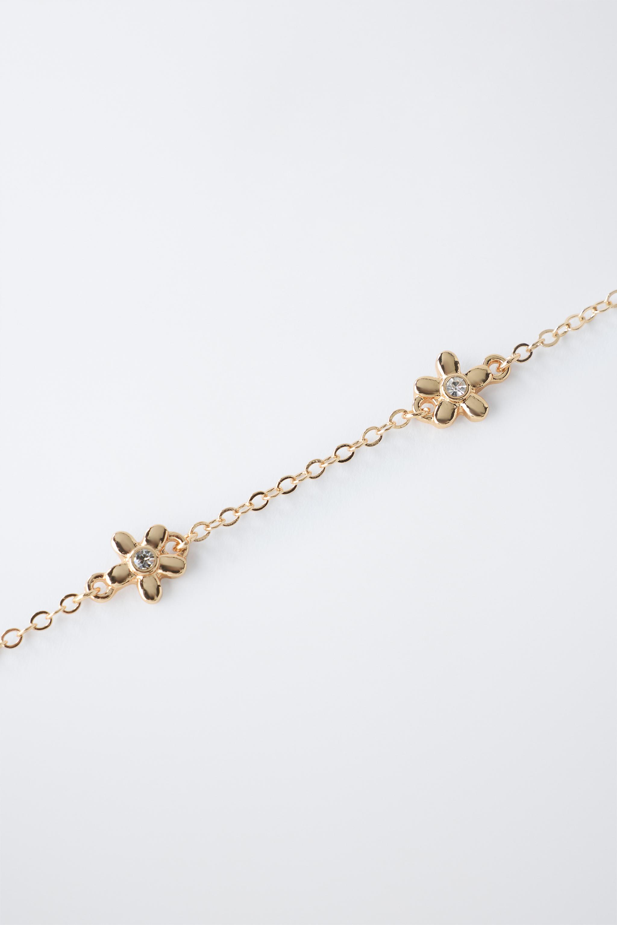 LOT DE DEUX COLLIERS FLEURS