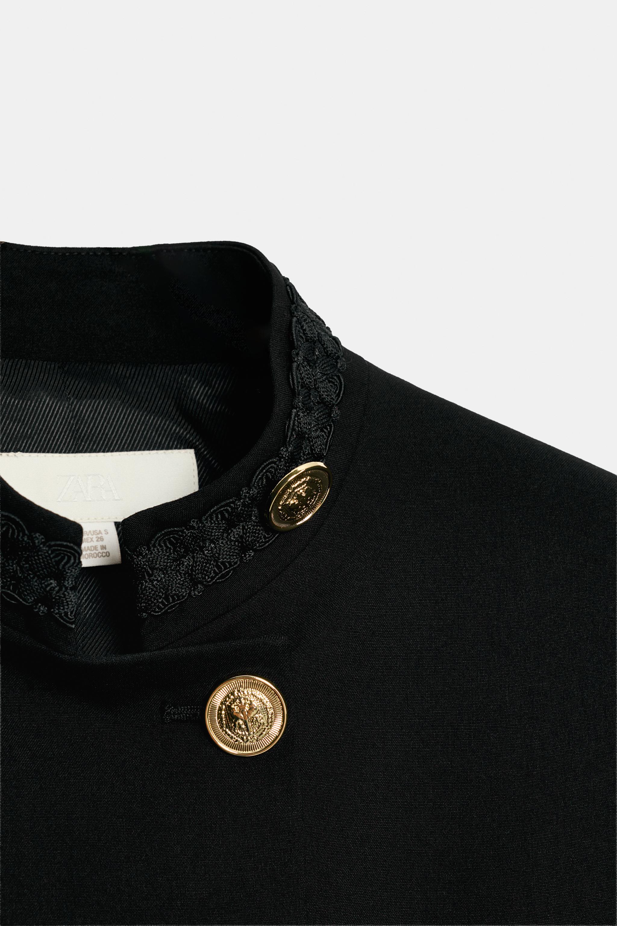 TRIMMED DOUBLE-BREASTED BLAZER