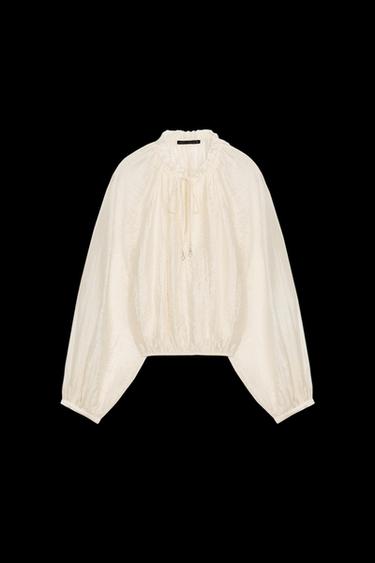 BLUSA FLUIDA MANGA ABULLONADA - Crudo de Zara