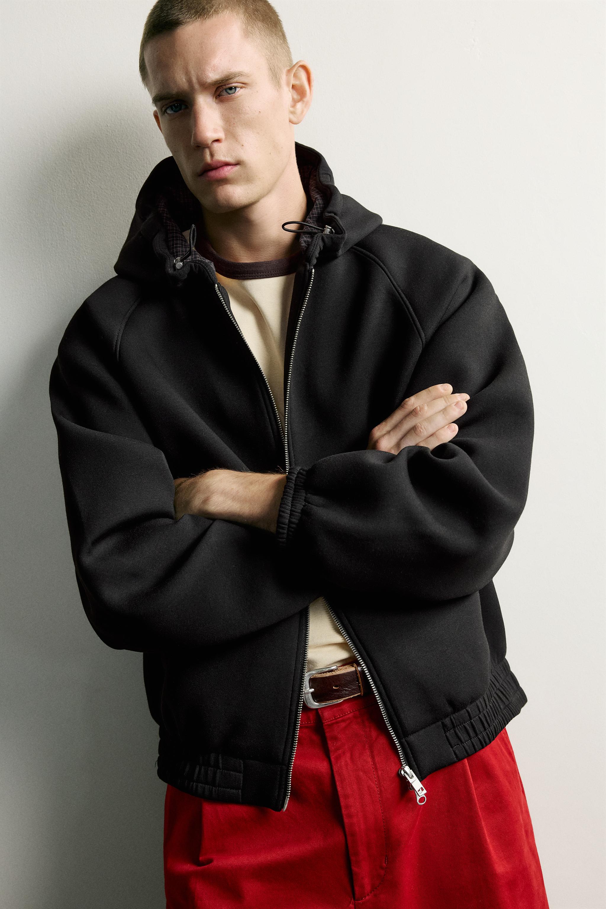 RELAXED-FIT TECHNICAL HOODED JACKET