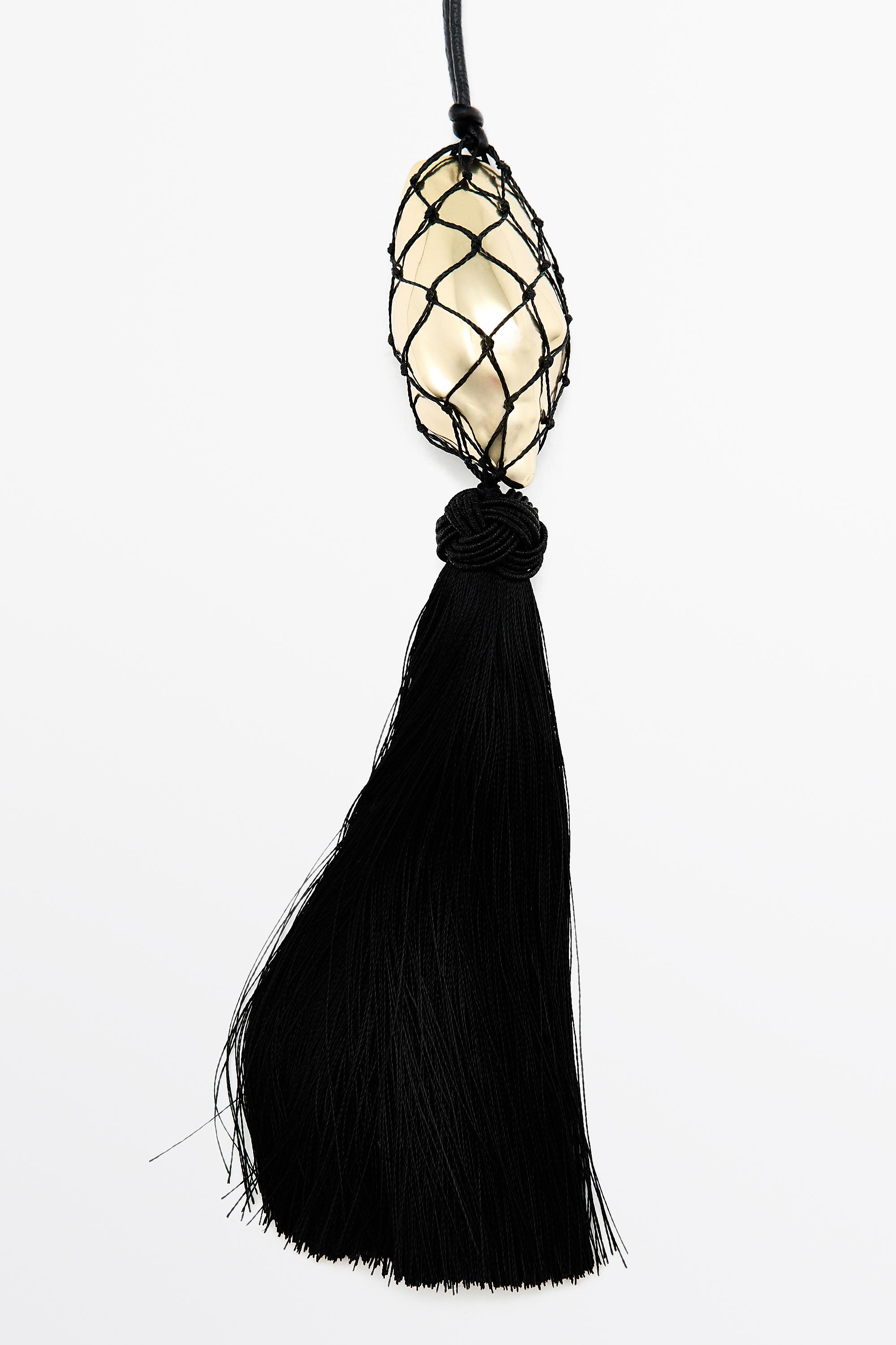 Long leather cord necklace with shell and tassel
