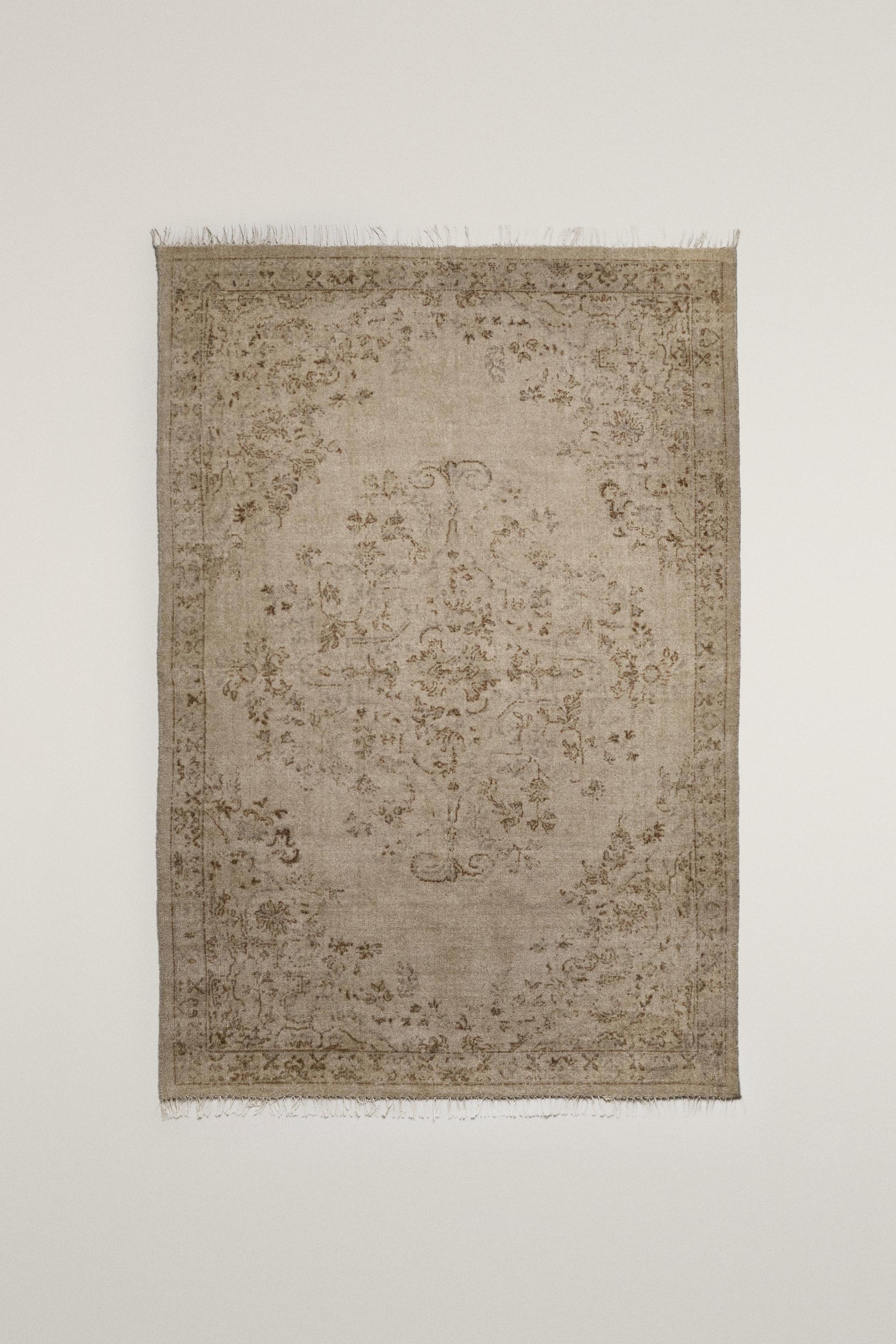 WOOL RUG WITH FLORAL PRINT