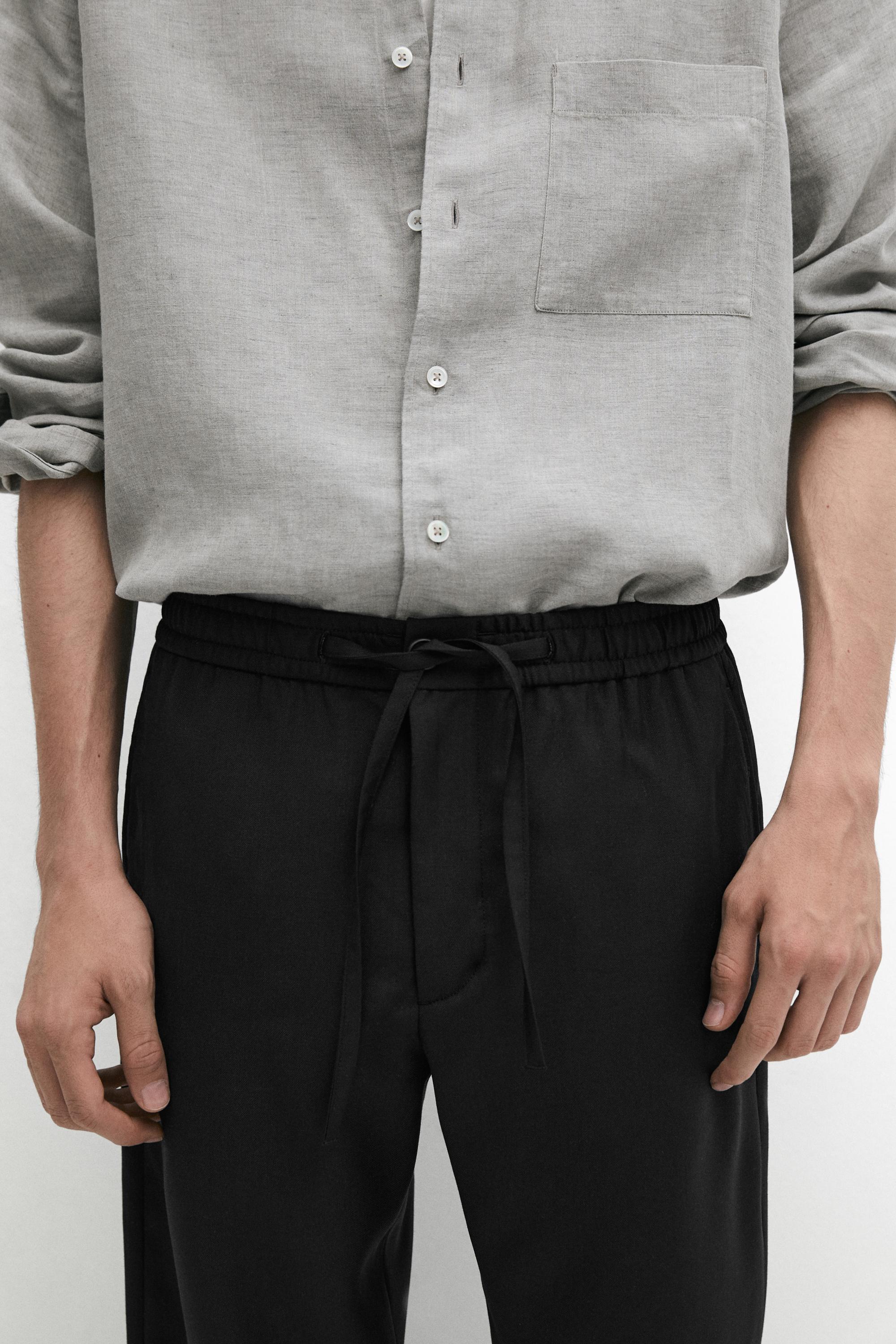 Relaxed fit 100% wool trousers