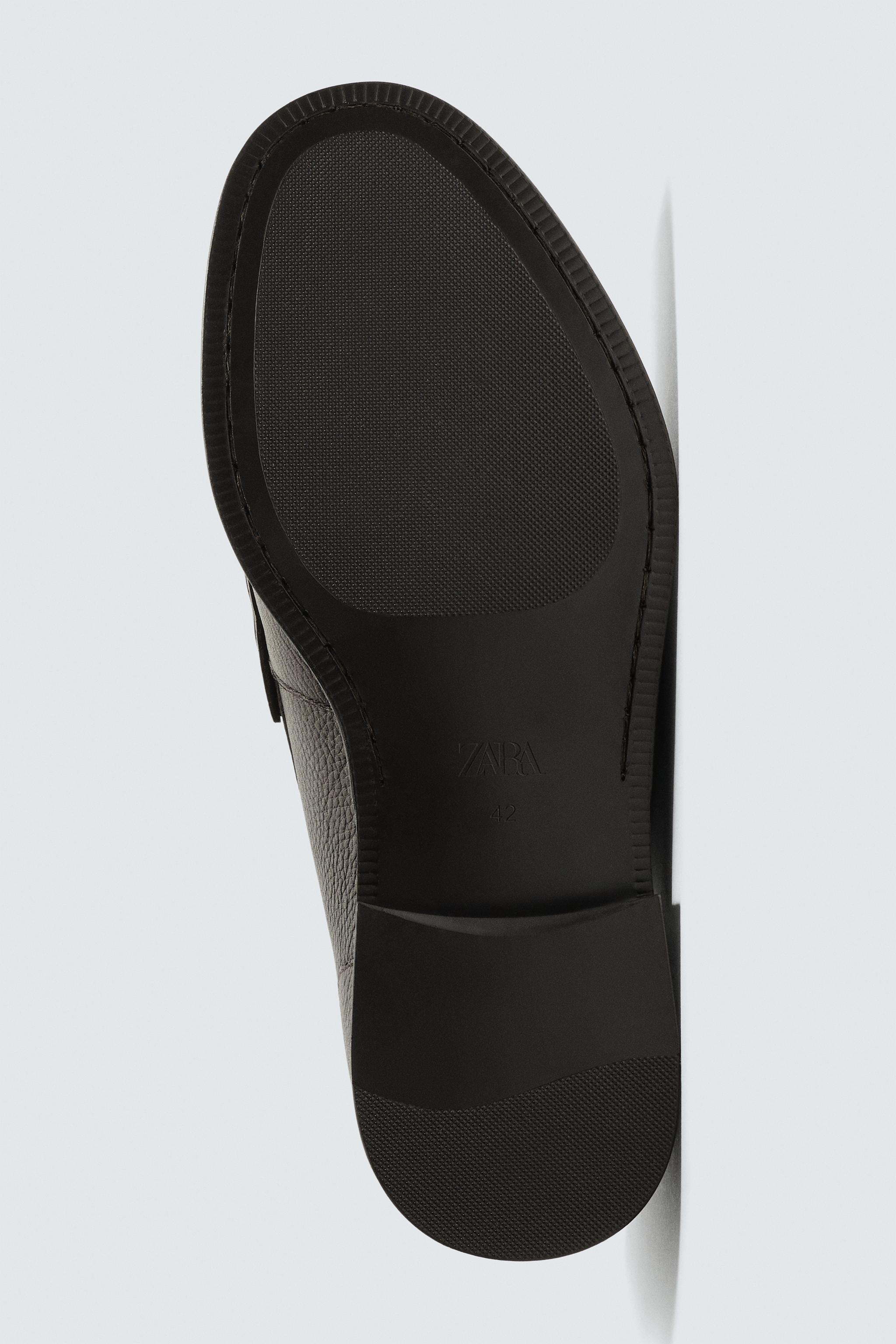 MOCASSINS EN CUIR AVEC MASQUE