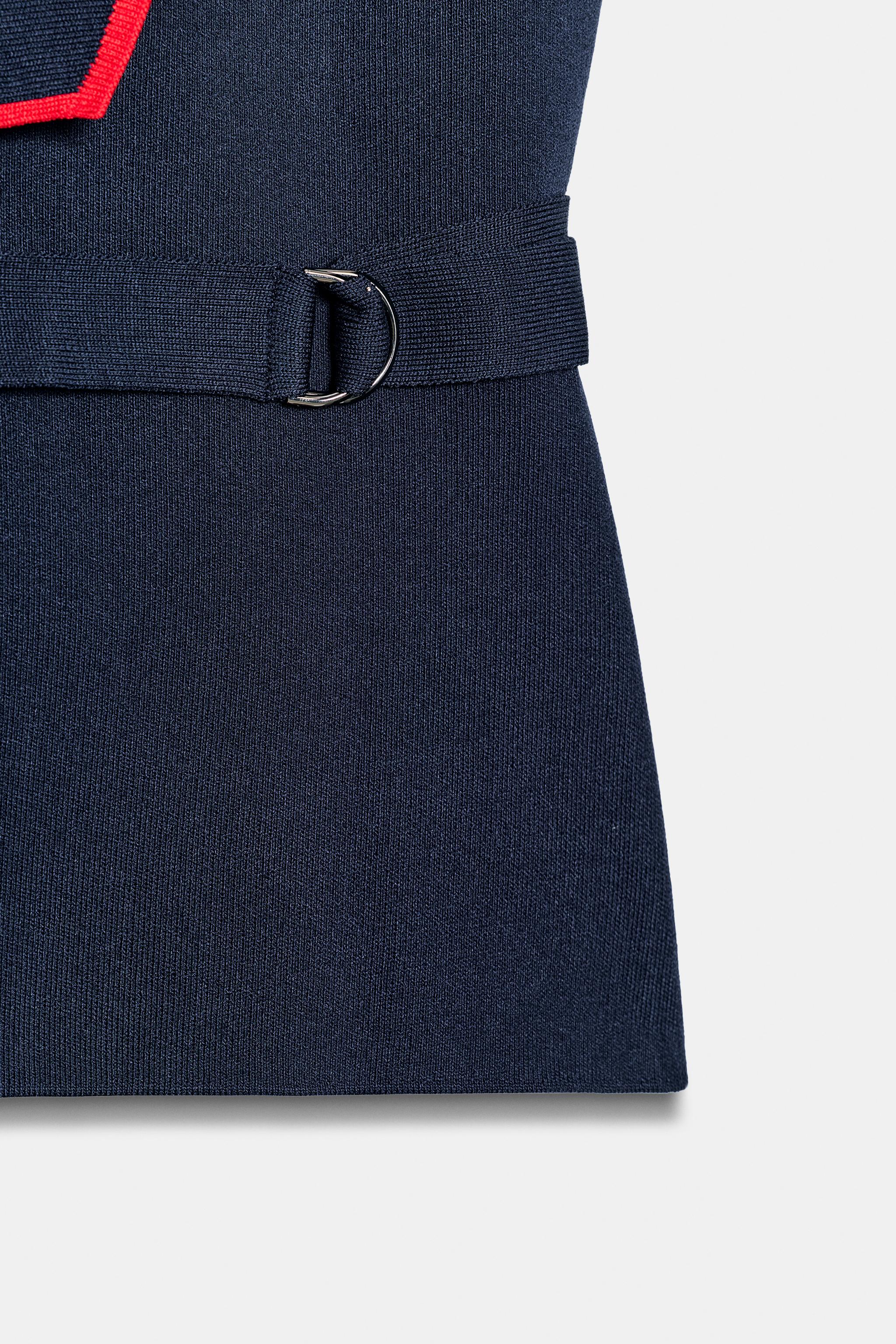 GILET CROISÉ À BOUCLES