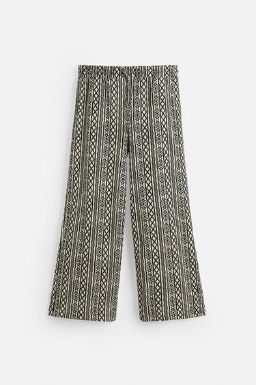 ŽAKÁROVÉ DÍROVANÉ KALHOTY RELAXED FIT - Přírodní / Černá od Zara