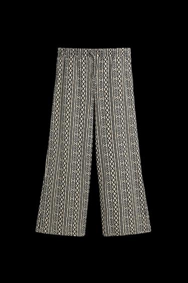 PANTALÓN RELAXED FIT JACQUARD PERFORADO - Crudo / Negro de Zara - Imagen 0