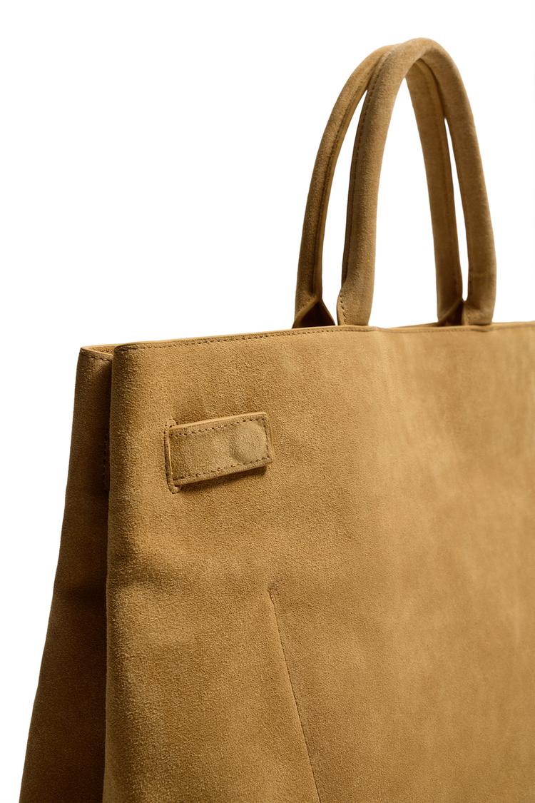 Bolso de mano de cuero con detalle de correa 3
