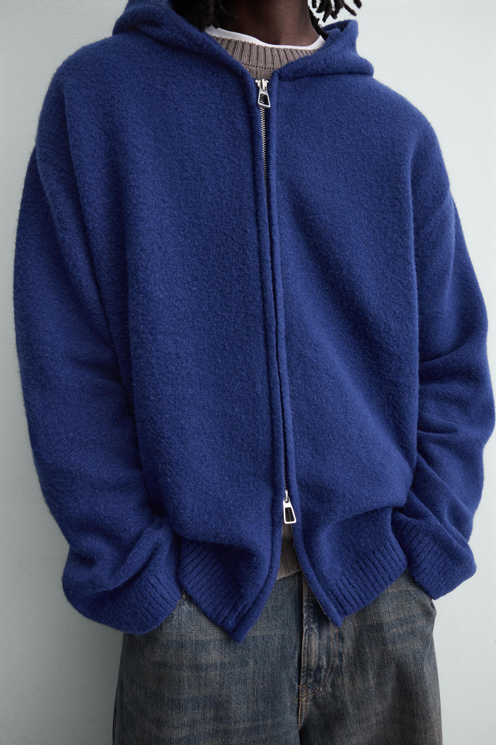 GILET EN MAILLE À CAPUCHE