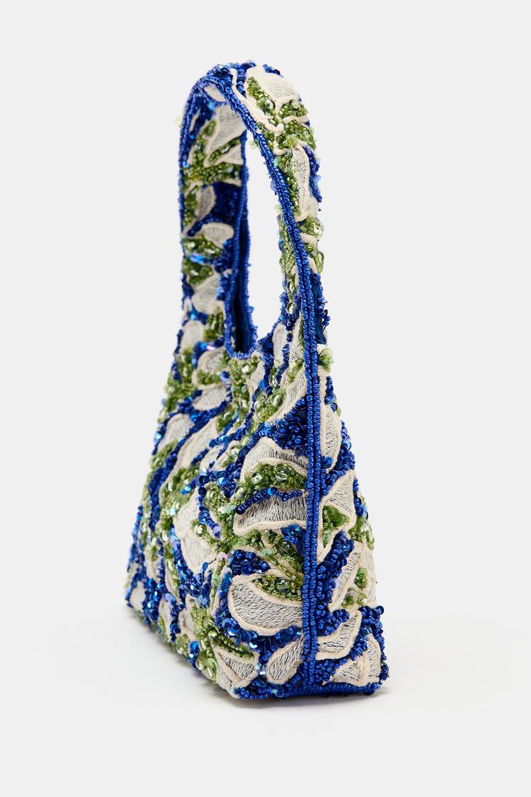 Cartera con cuentas 5