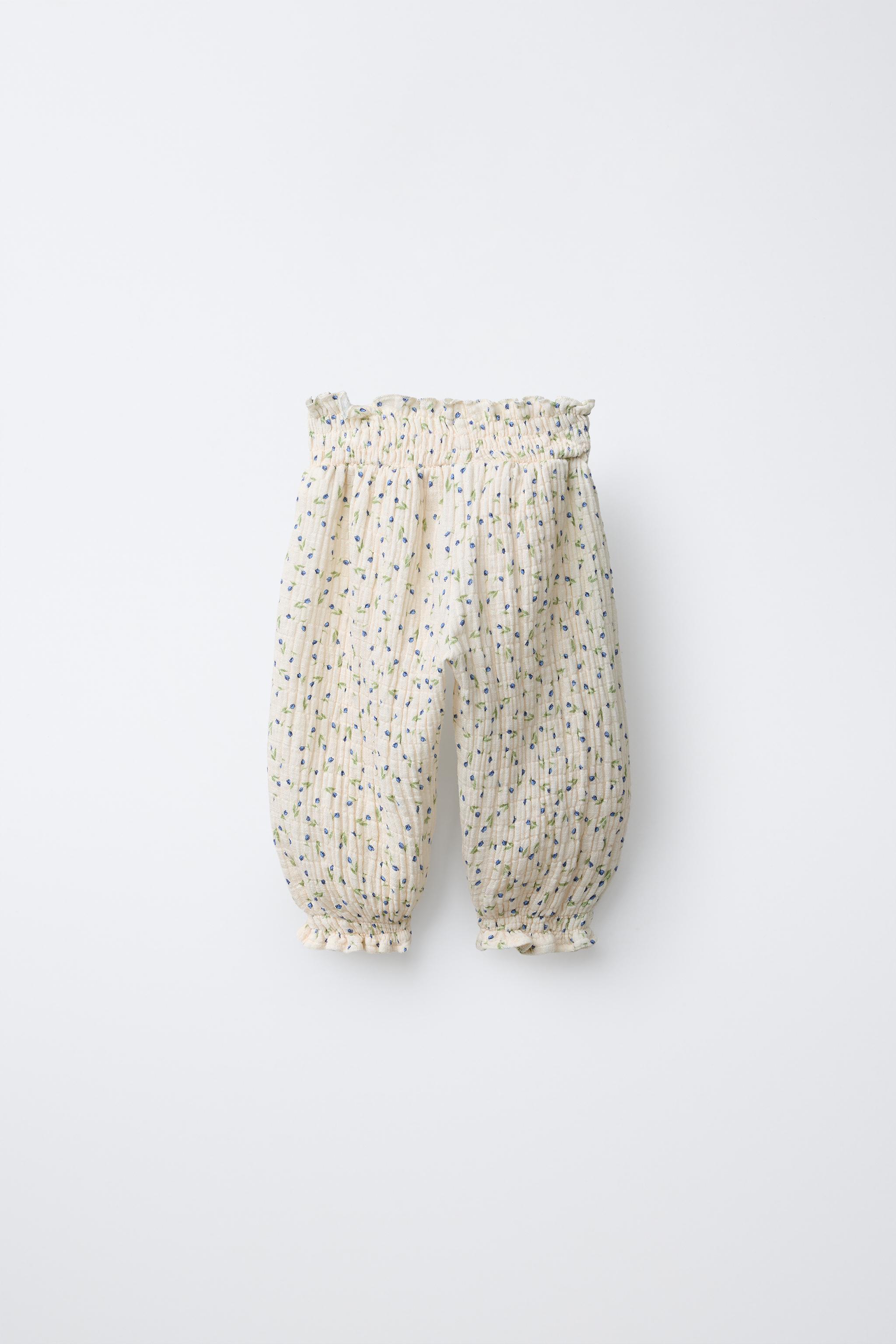 FLORAL TEXTURED BAGGY PANTS