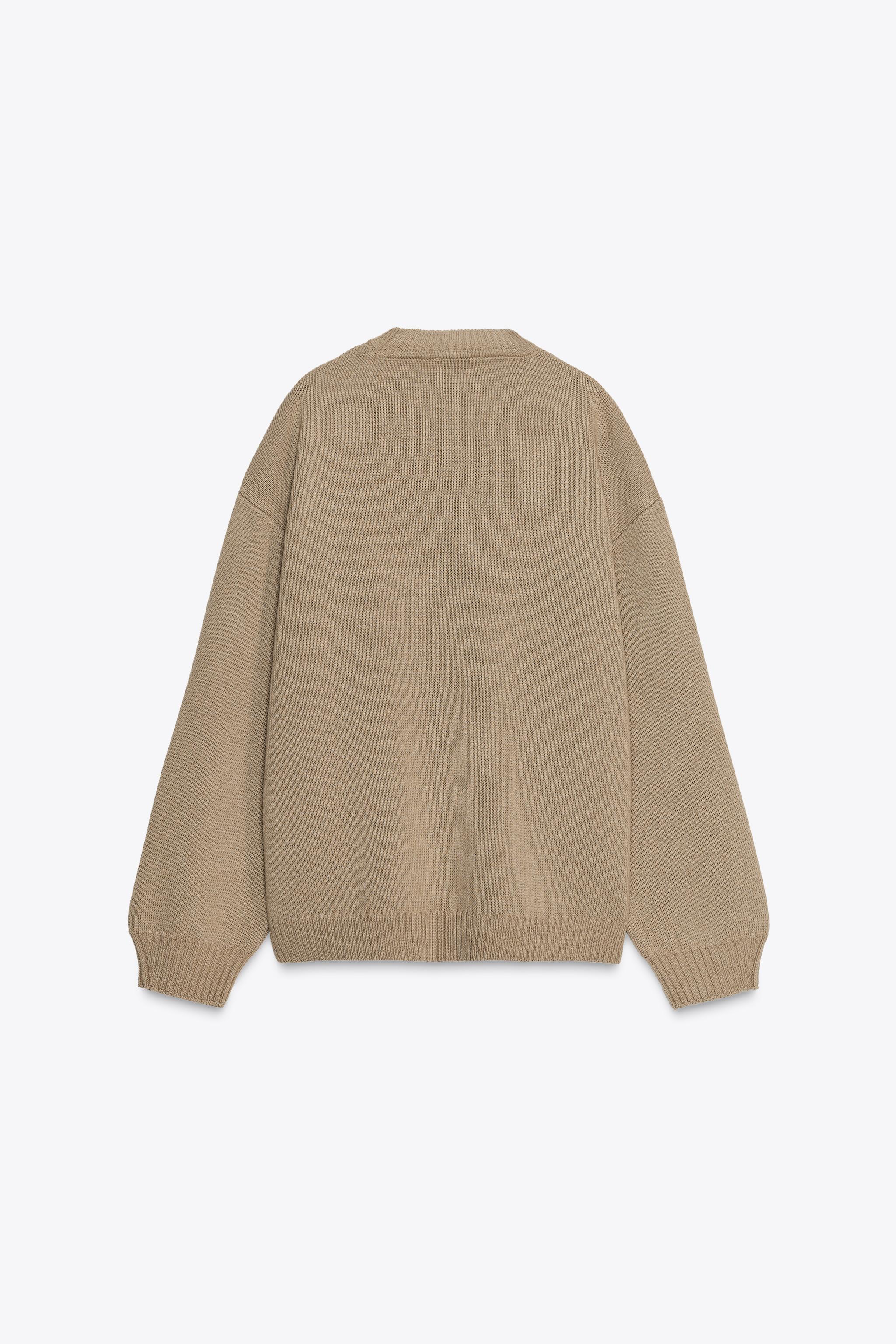 OVERSIZED KNIT SWEATER