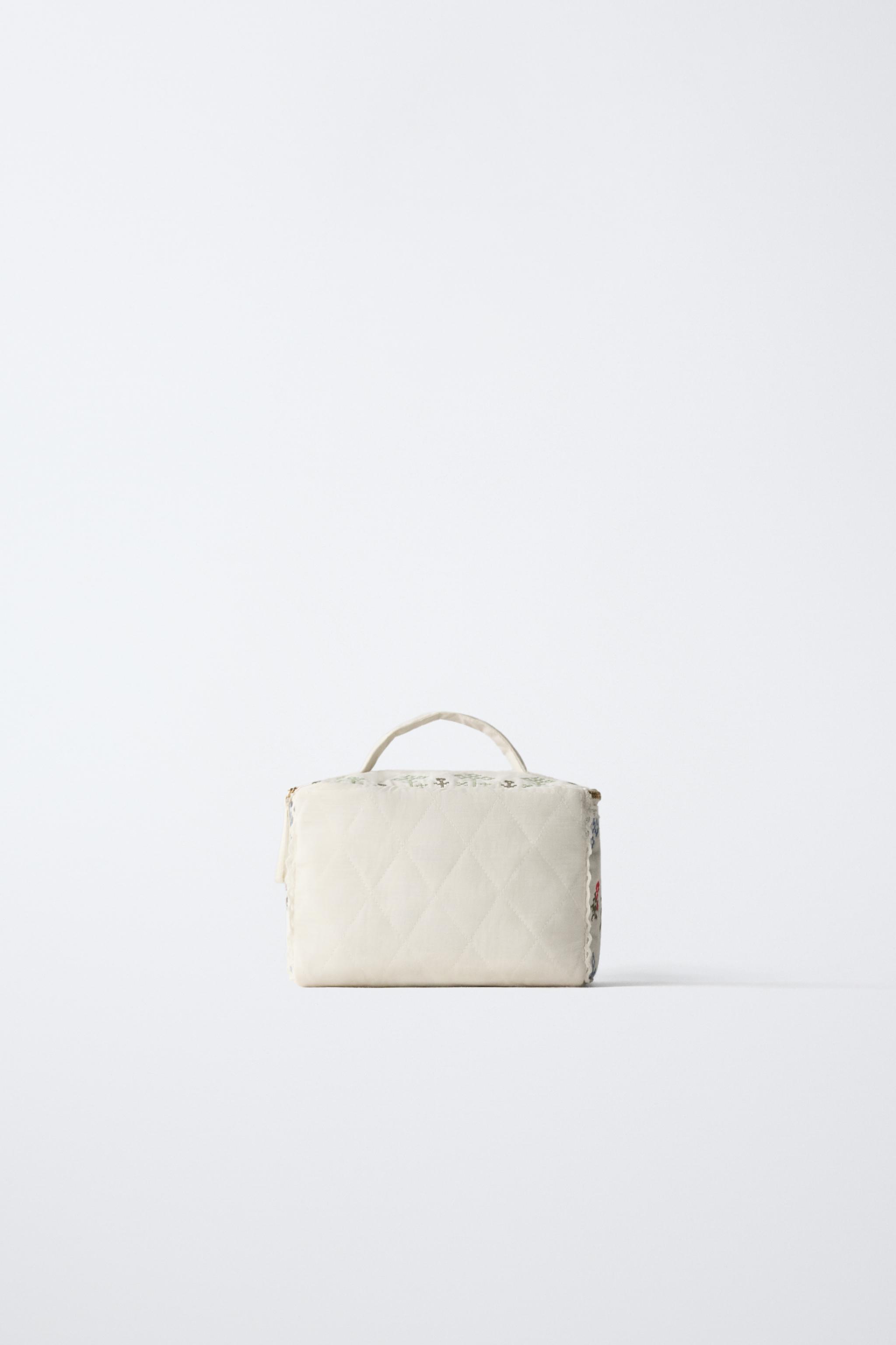 EMBROIDERED TOILETRY BAG