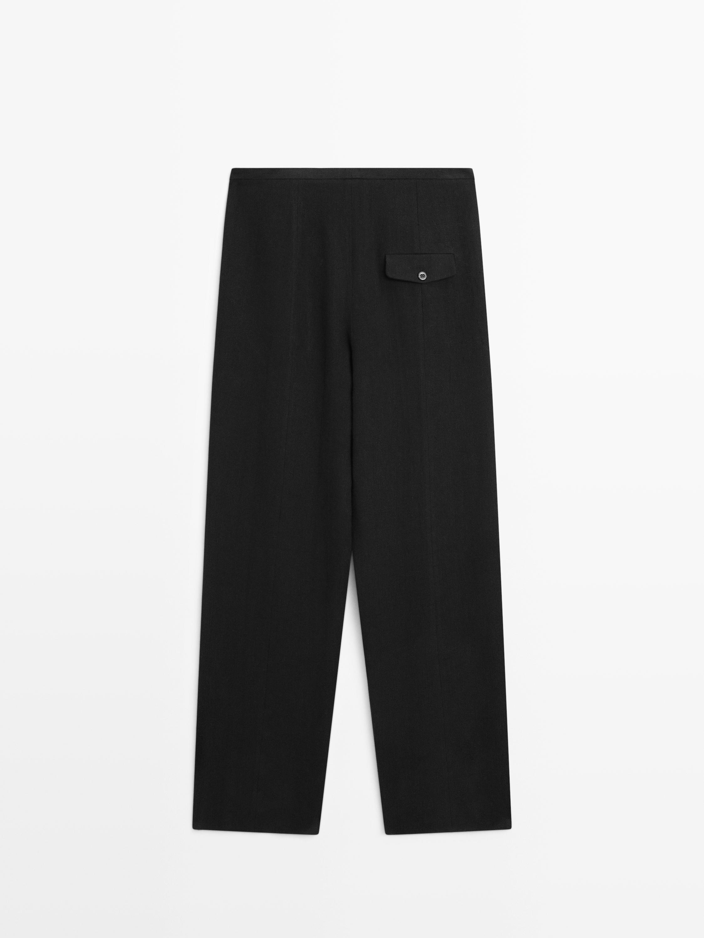 Flowing linen blend trousers with pocket details
