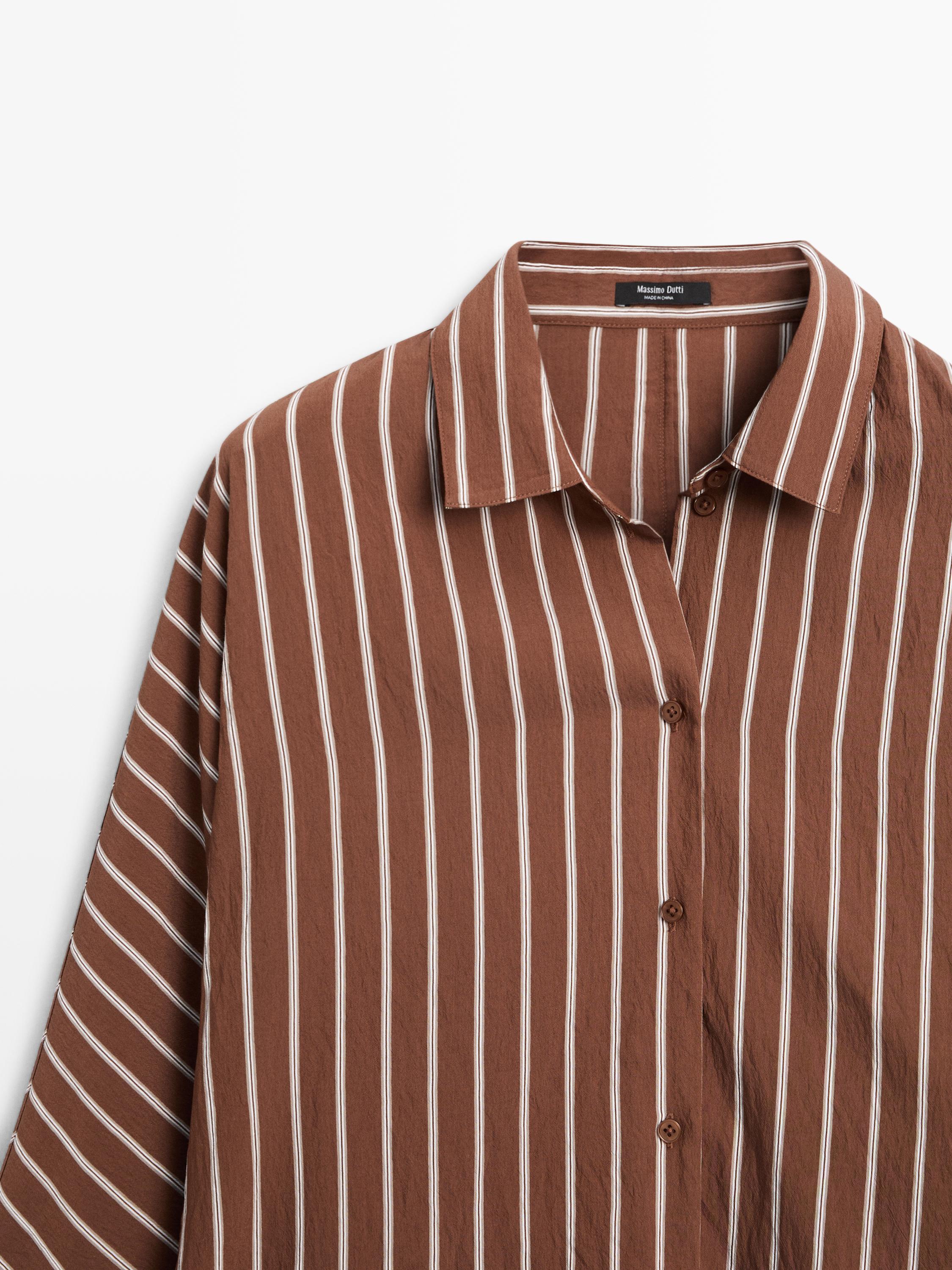 Flowing striped shirt with batwing sleeves