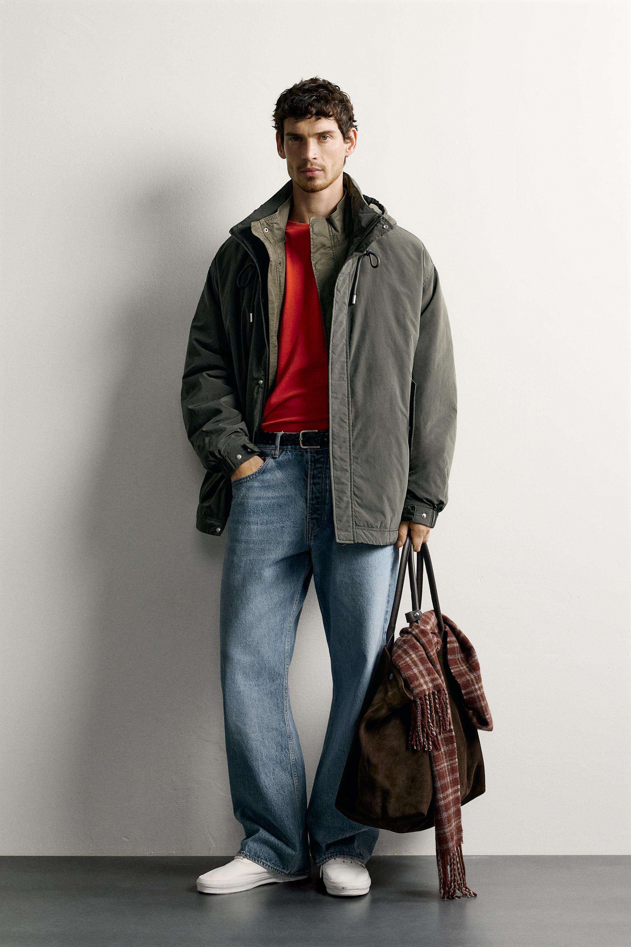 BLOUSON TECHNIQUE À CAPUCHE DÉPERLANT