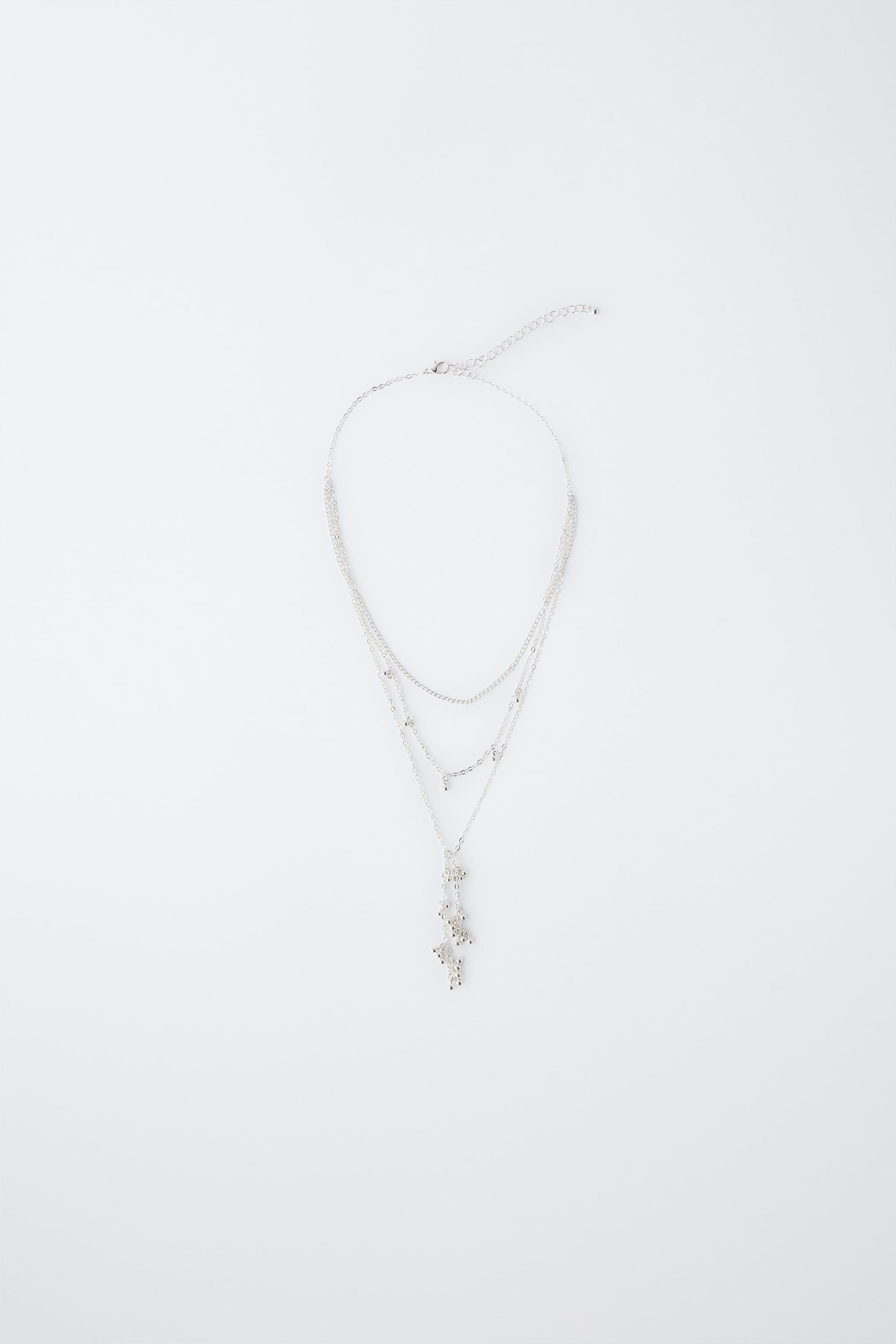COLLAR MULTICADENA FLECOS