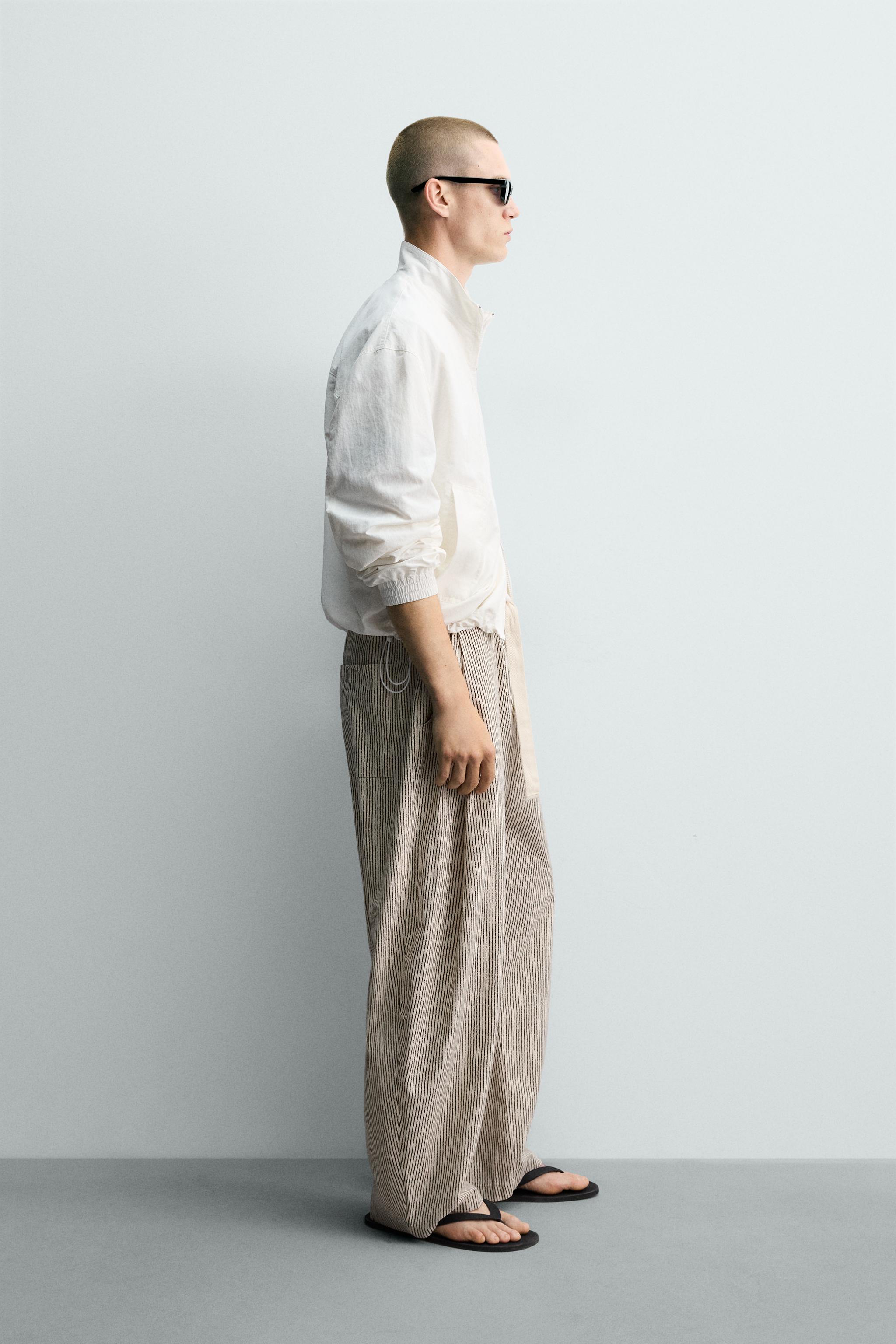 STRIPED WIDE FIT BELTED PANTS — striped