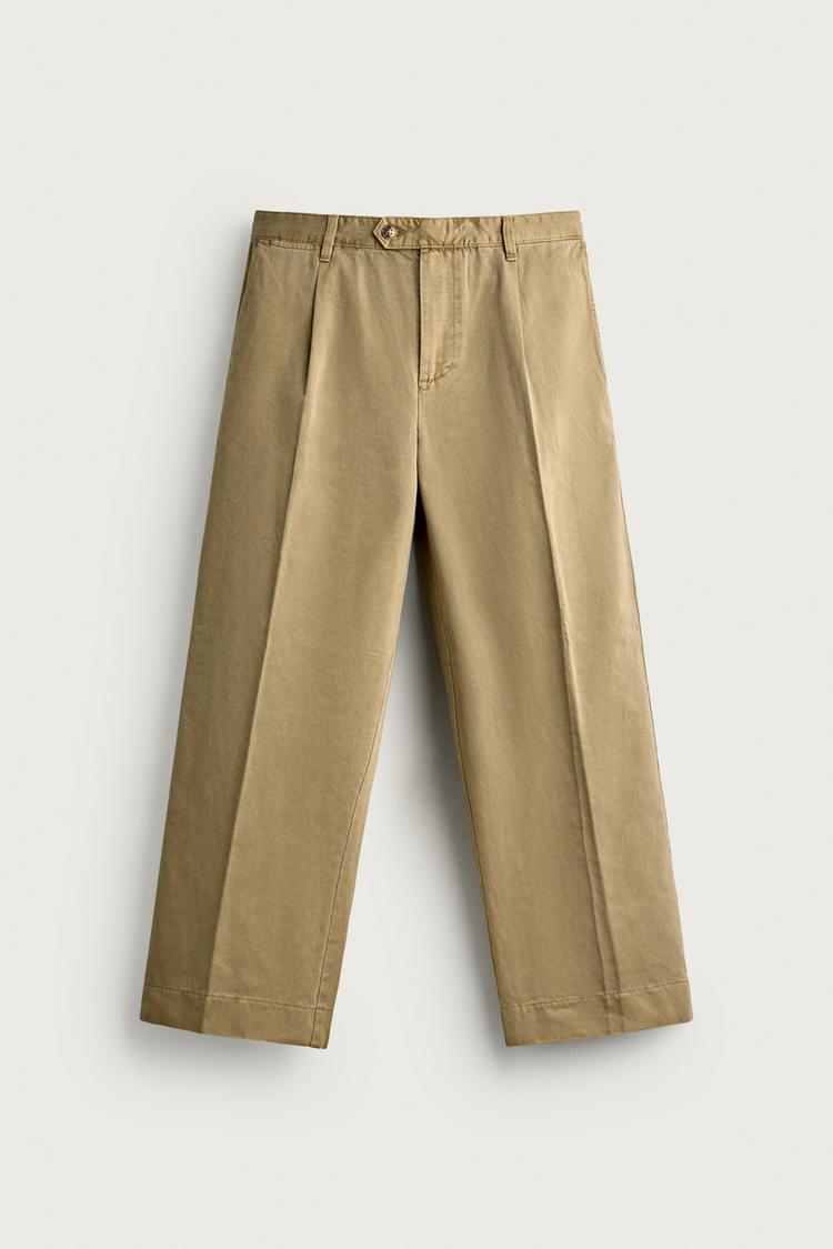 Pantalon chino relaxed fit pliegues