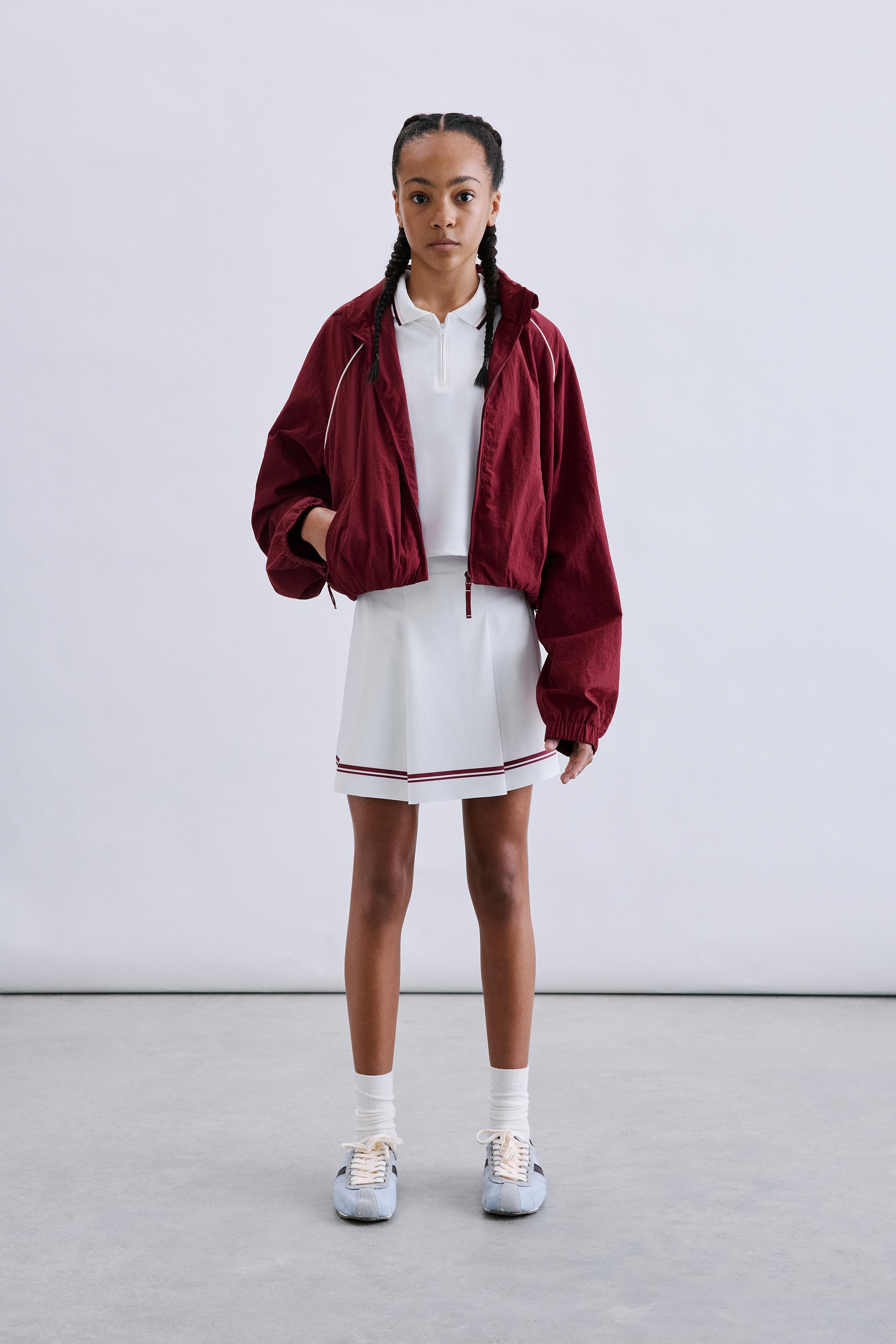 BLOUSON SPORT À LISERÉS CONTRASTANTS