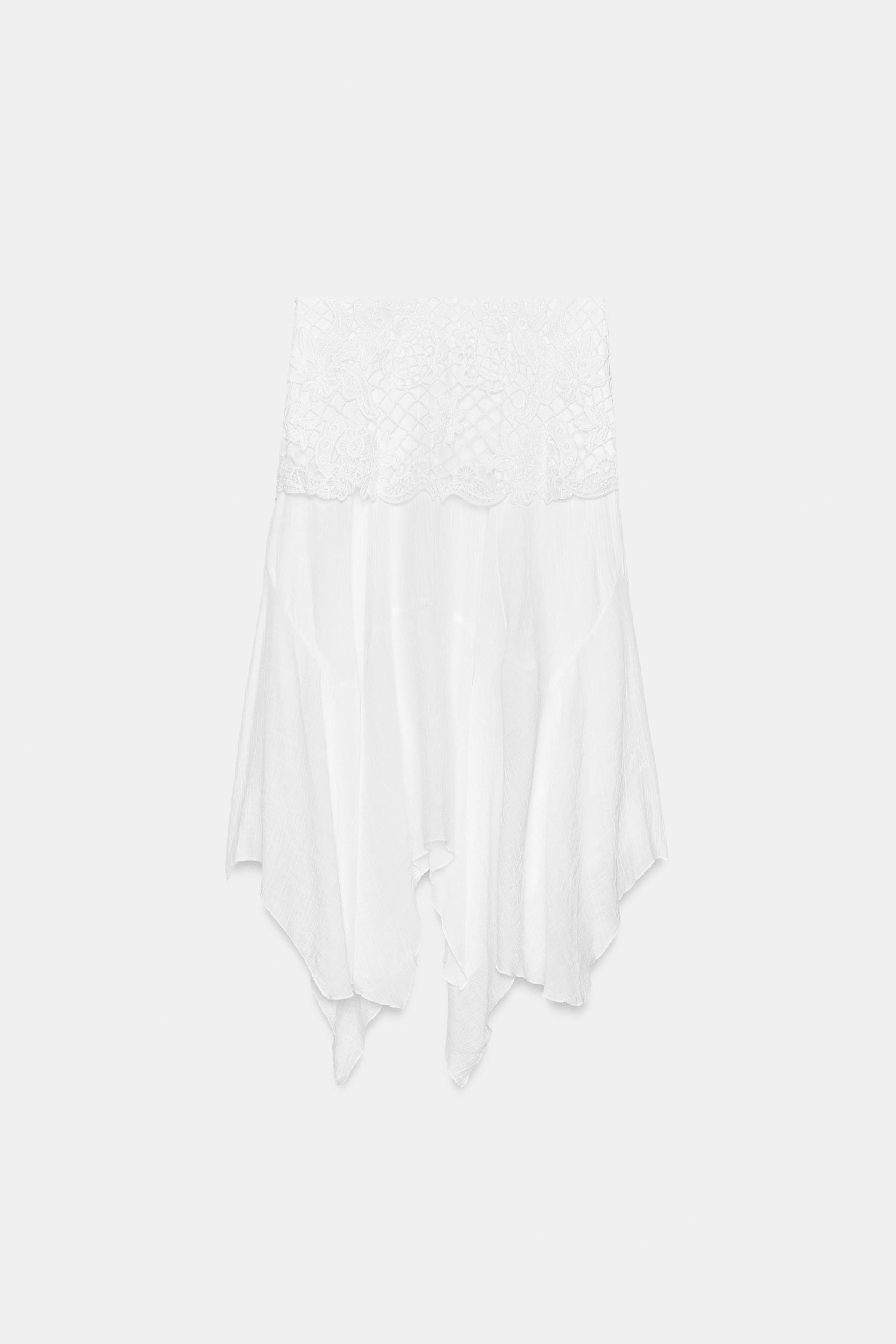 JUPE MI-LONGUE ASYMÉTRIQUE BRODÉE