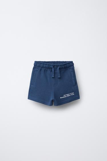 BERMUDA PIQUÉ TEXTO - Azul de Zara