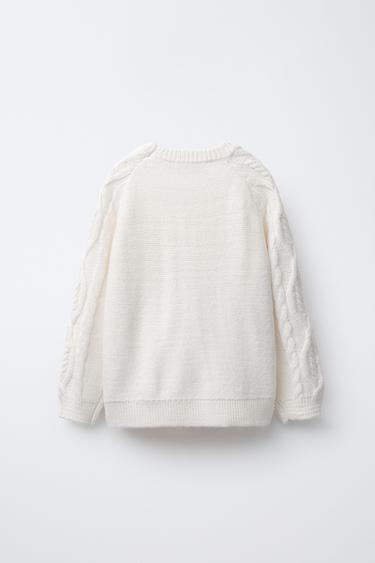 PULL EN MAILLE À TORSADES - Écru de Zara - Image 1