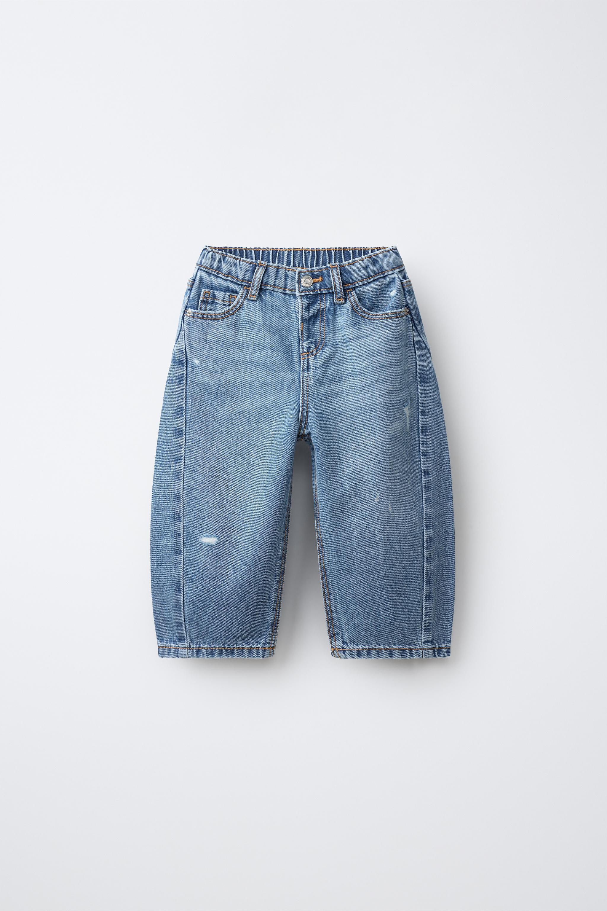 DISTRESSED BARREL JEANS