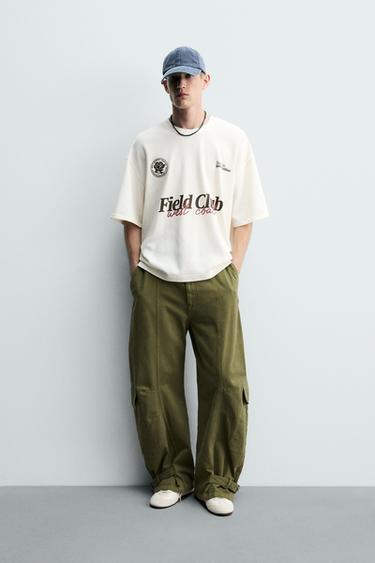 CAMISETA ESTRUCTURA ESTAMPADOS CONTRASTE - Blanco roto de Zara - Imagen 0