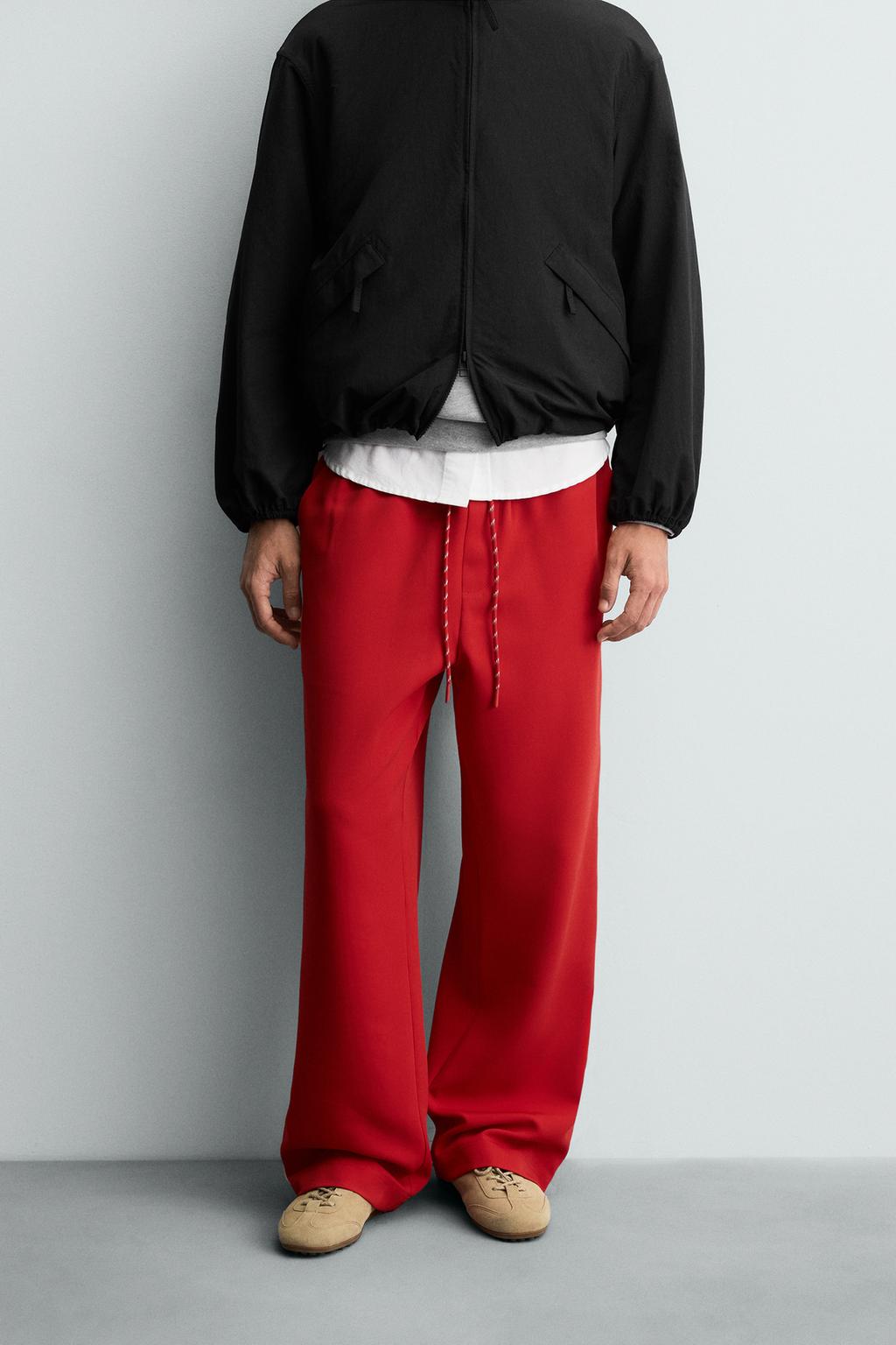 WIDE FIT JOGGER PANTS WITH SIDE STRIPES