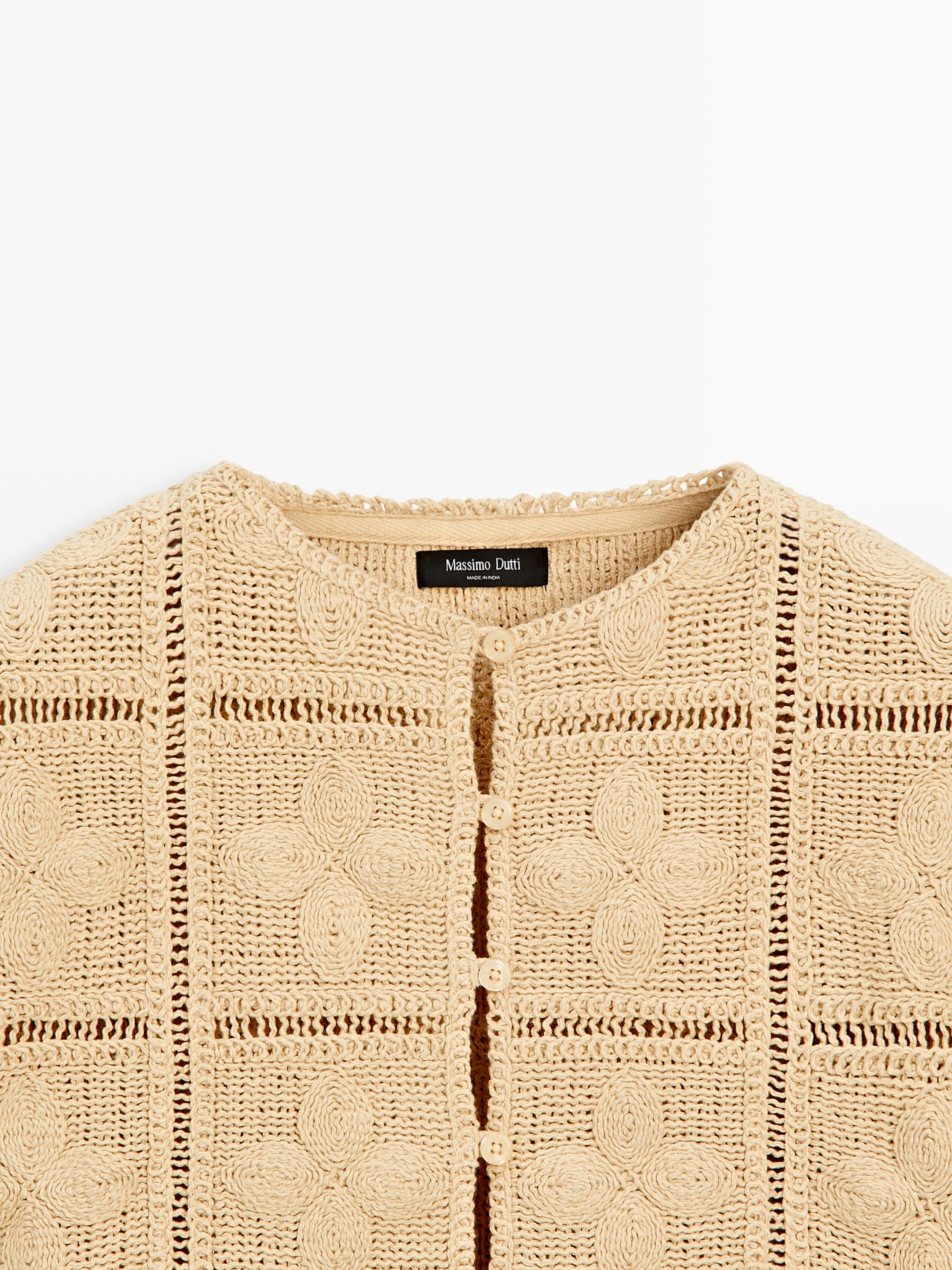 Veste en maille ajourée et crochet