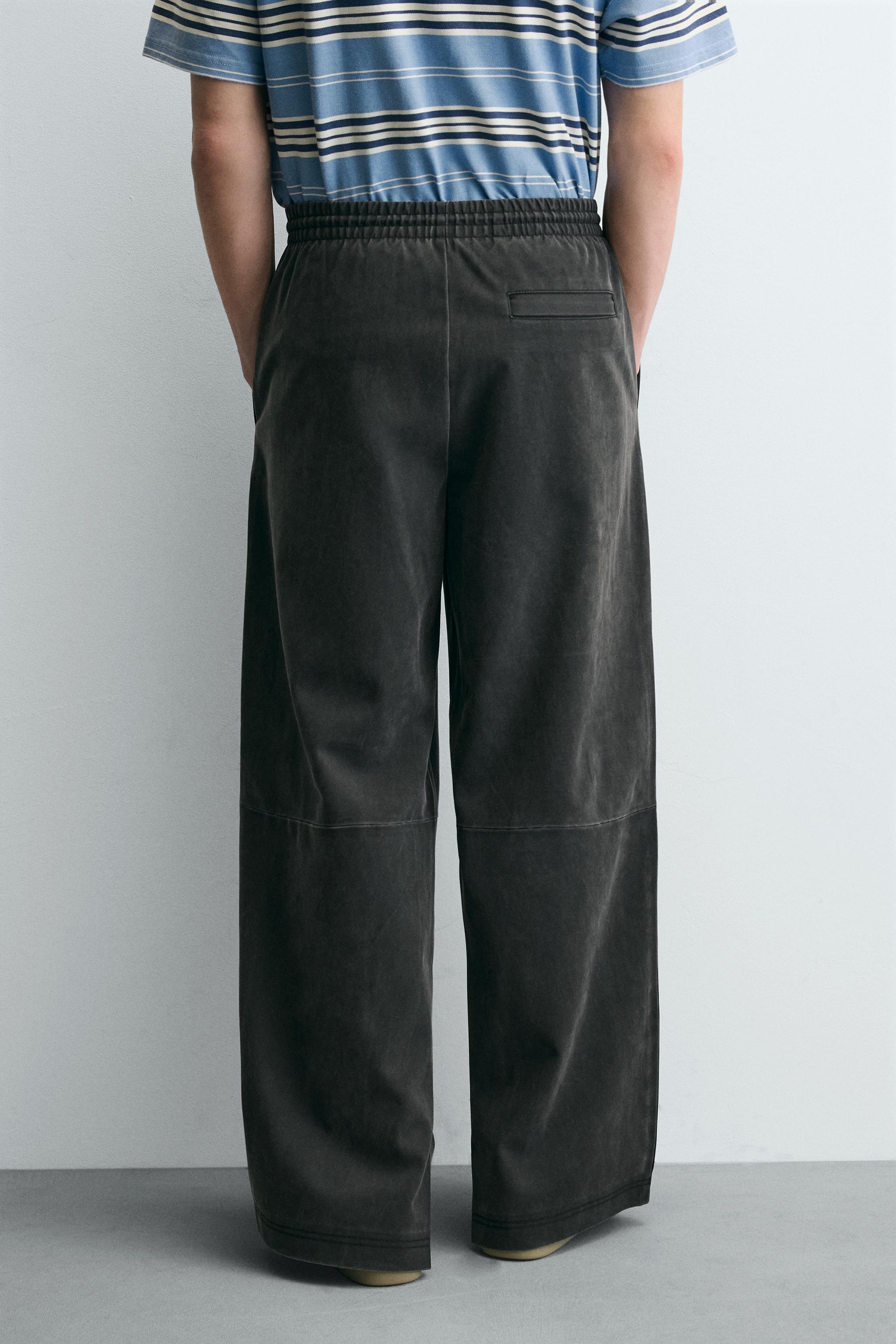 STUDDED FAUX LEATHER RELAXED FIT PANTS
