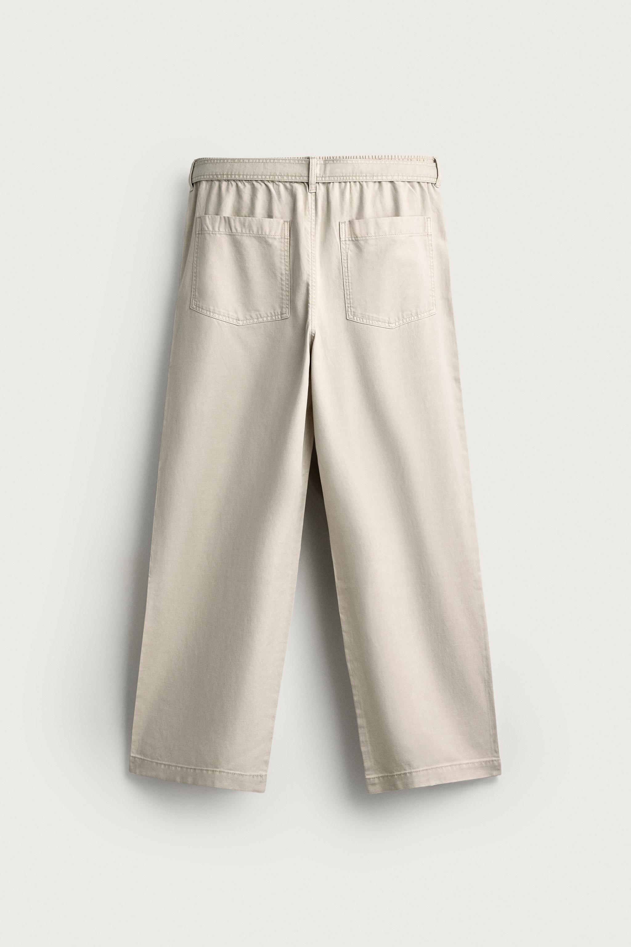 PANTALON COUPE DÉCONTRACTÉE À PLIS AVEC CEINTURE