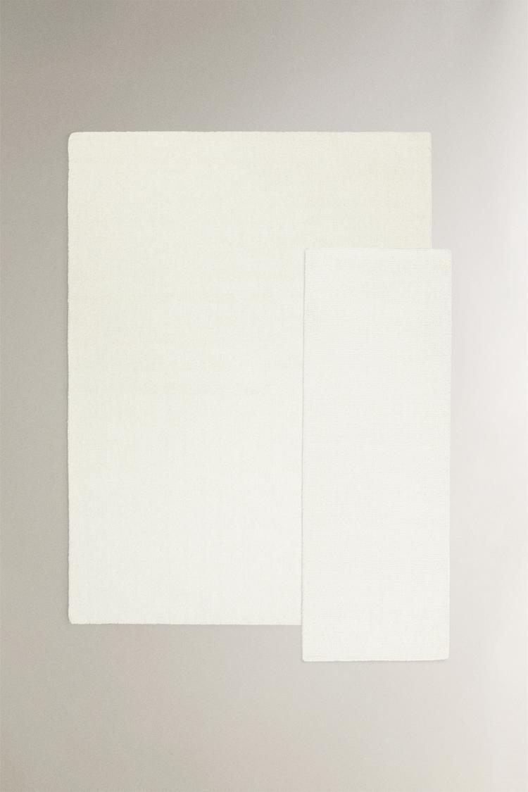 WOOL AREA RUG — Ecru