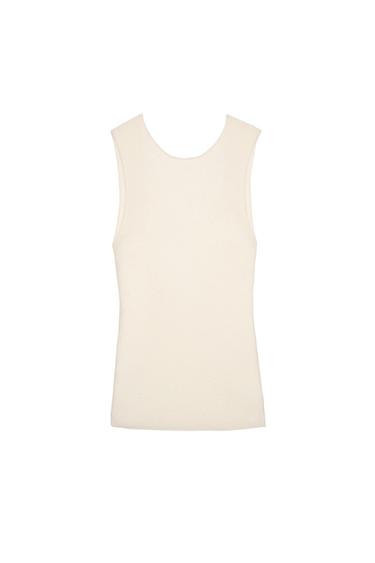 Cream-colored tank top on a white background.