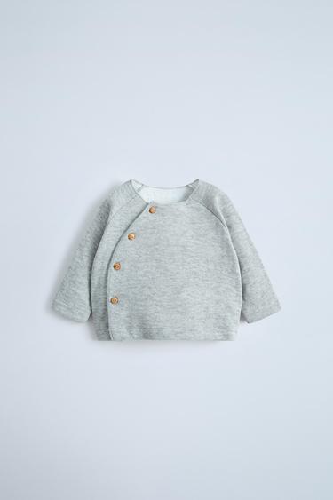CAMISETA FELPA BOTONES - Gris vigoré de Zara - Imagen 0
