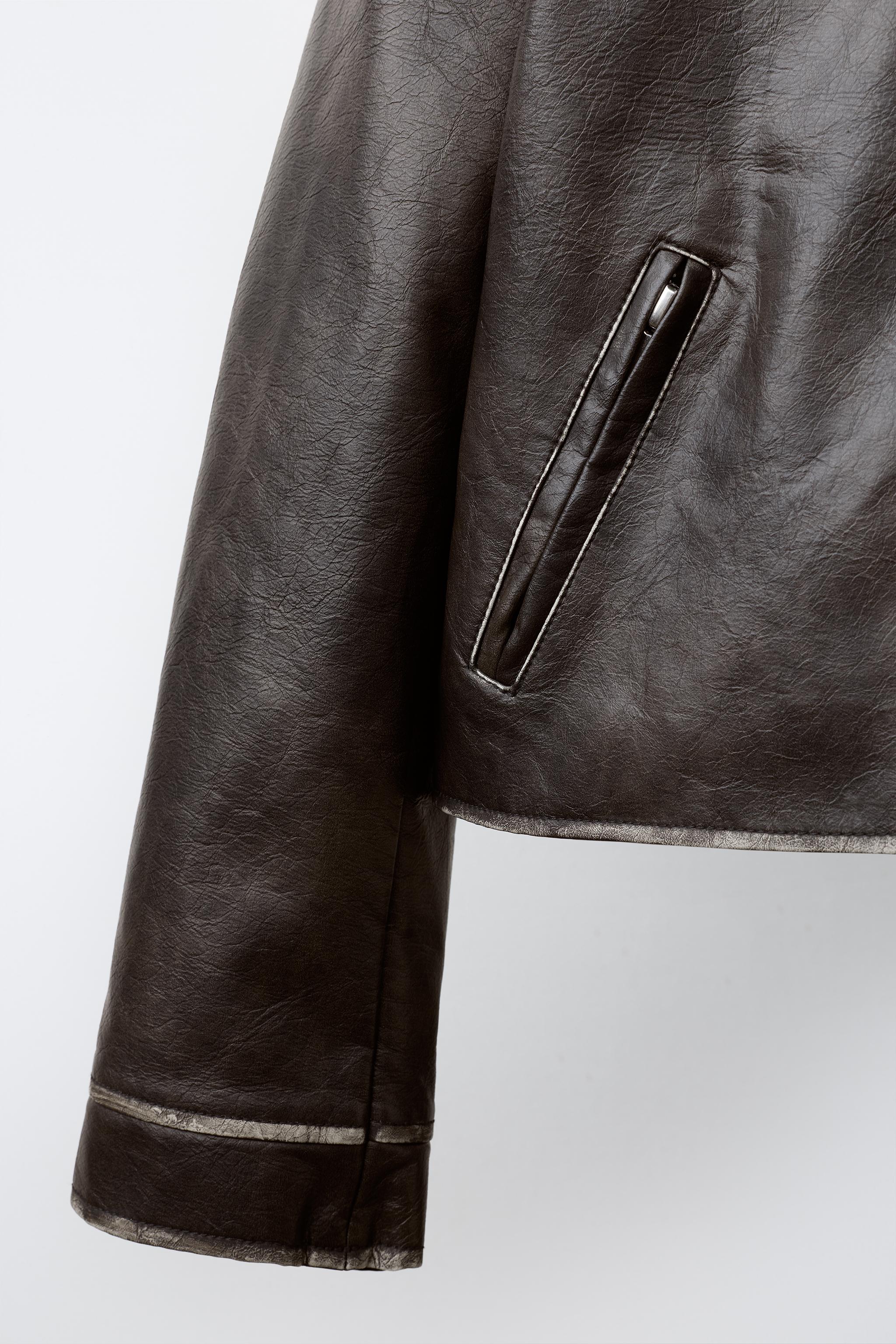 BLOUSON EN MATIÈRE SYNTHÈTIQUE USÉ À COL EFFET FOURRURE