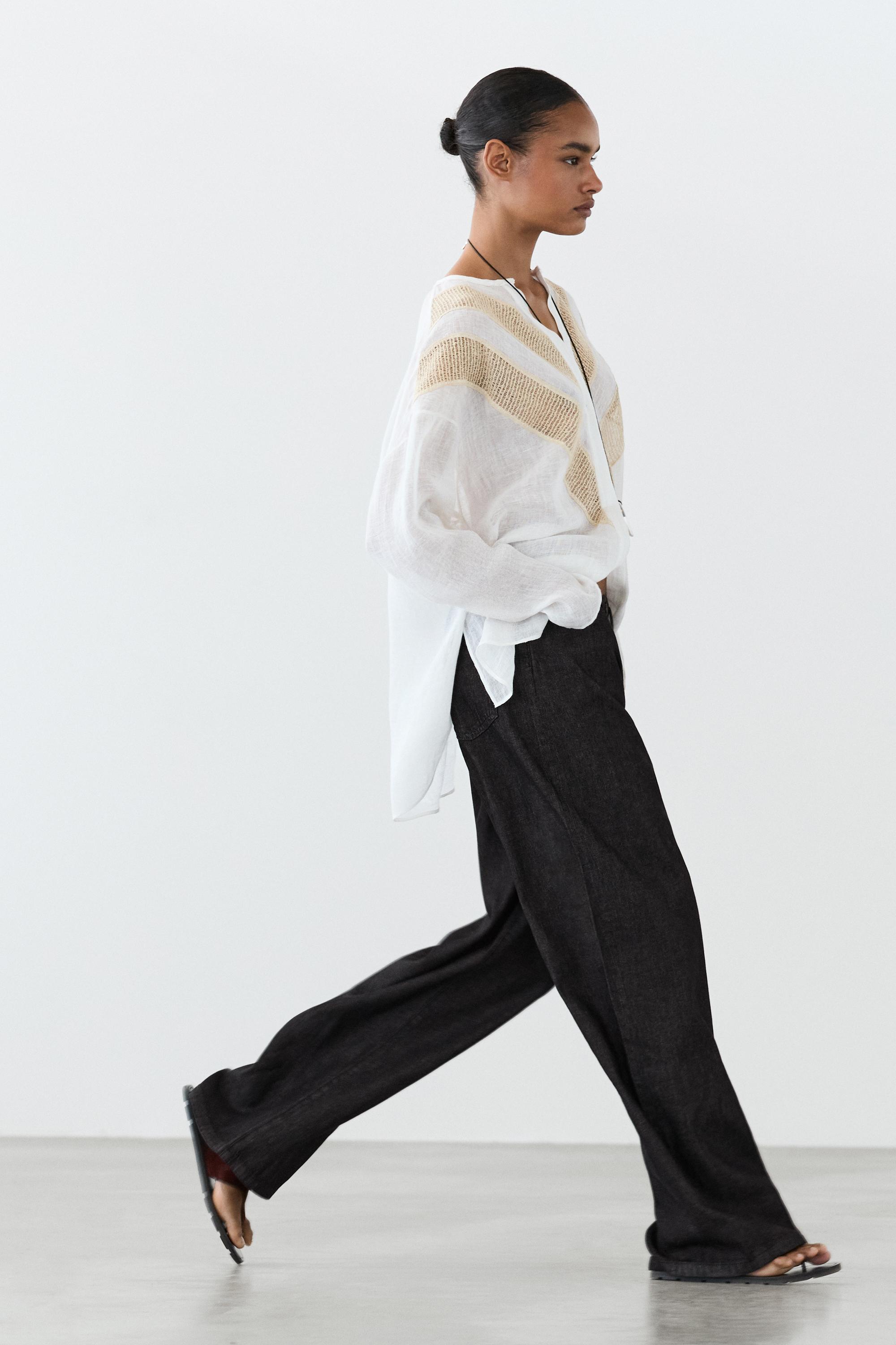 Flowing linen blend shirt with appliqué detail