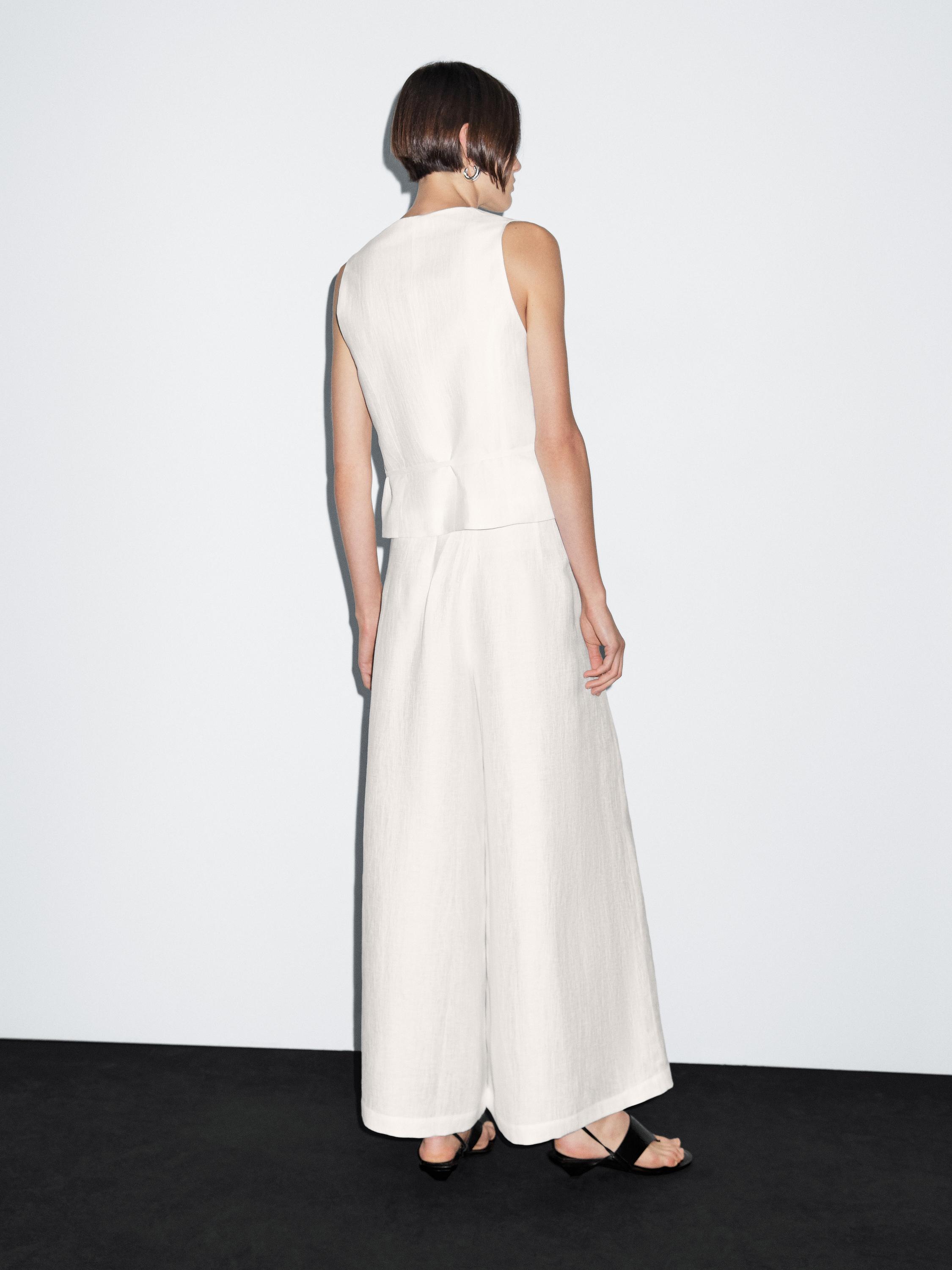 Wide-leg voluminous linen blend trousers