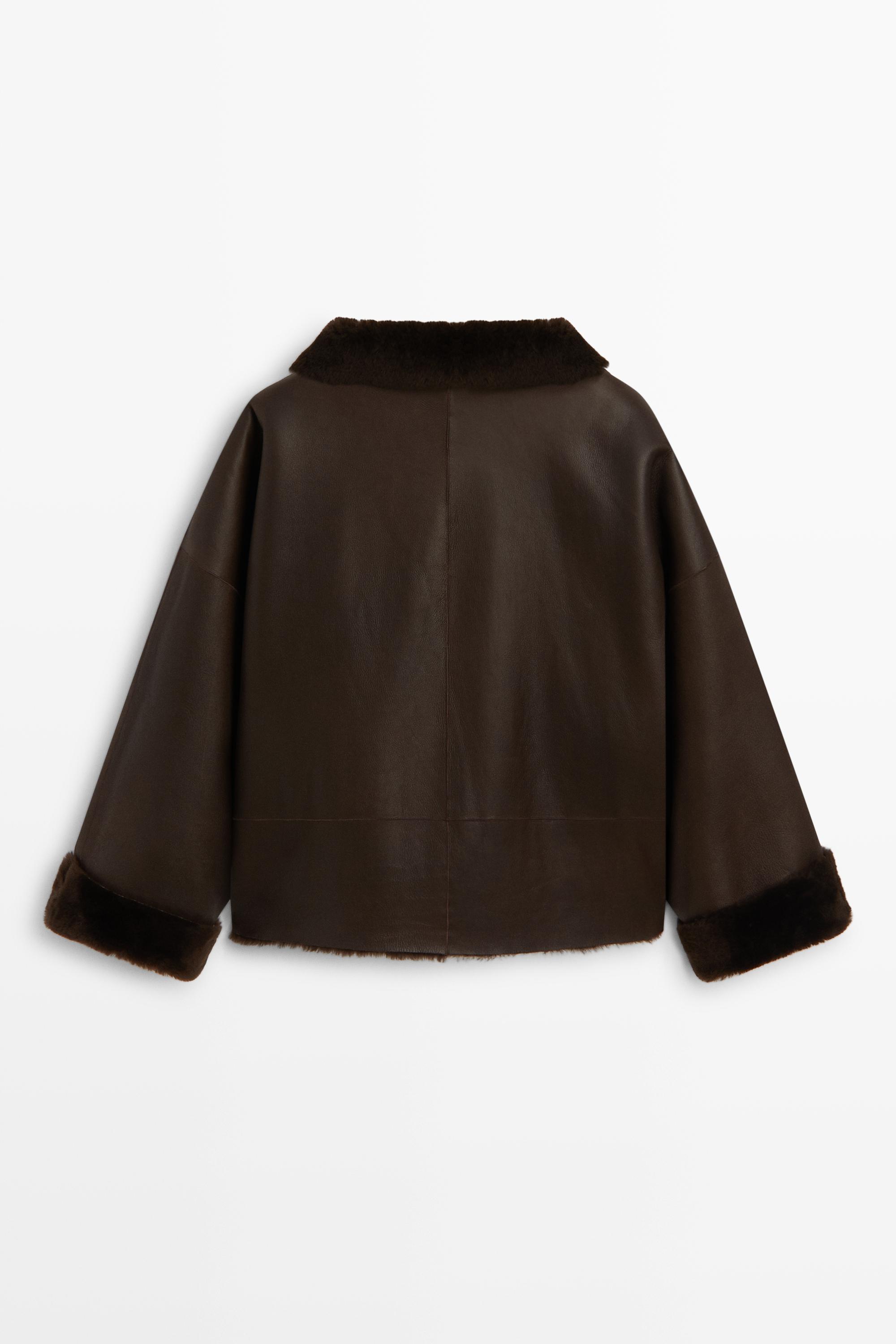 Manteau réversible en cuir avec fourrure