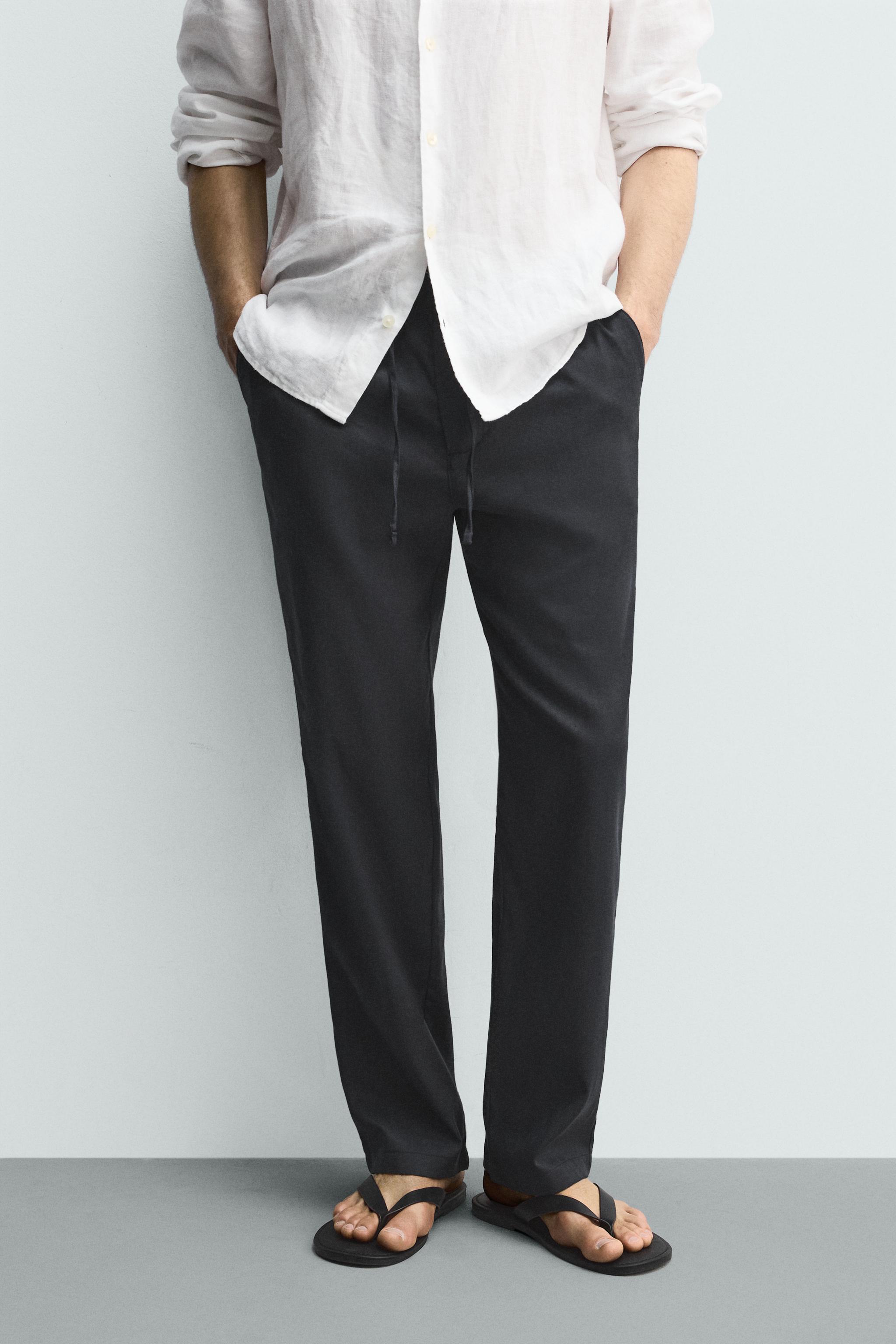 COTTON/LINEN RELAXED FIT TROUSERS — Navy blue