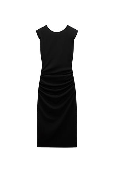 DRESS WITH SHOULDER PADS AND GATHERING