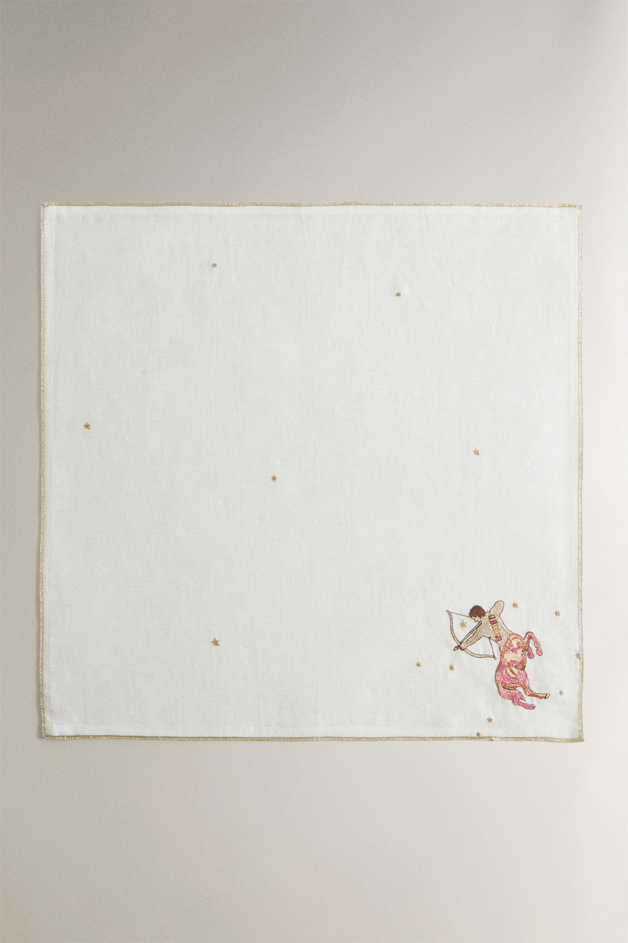 SAGITTARIUS EMBROIDERED LINEN NAPKIN | MARISA BERENSON — Ecru