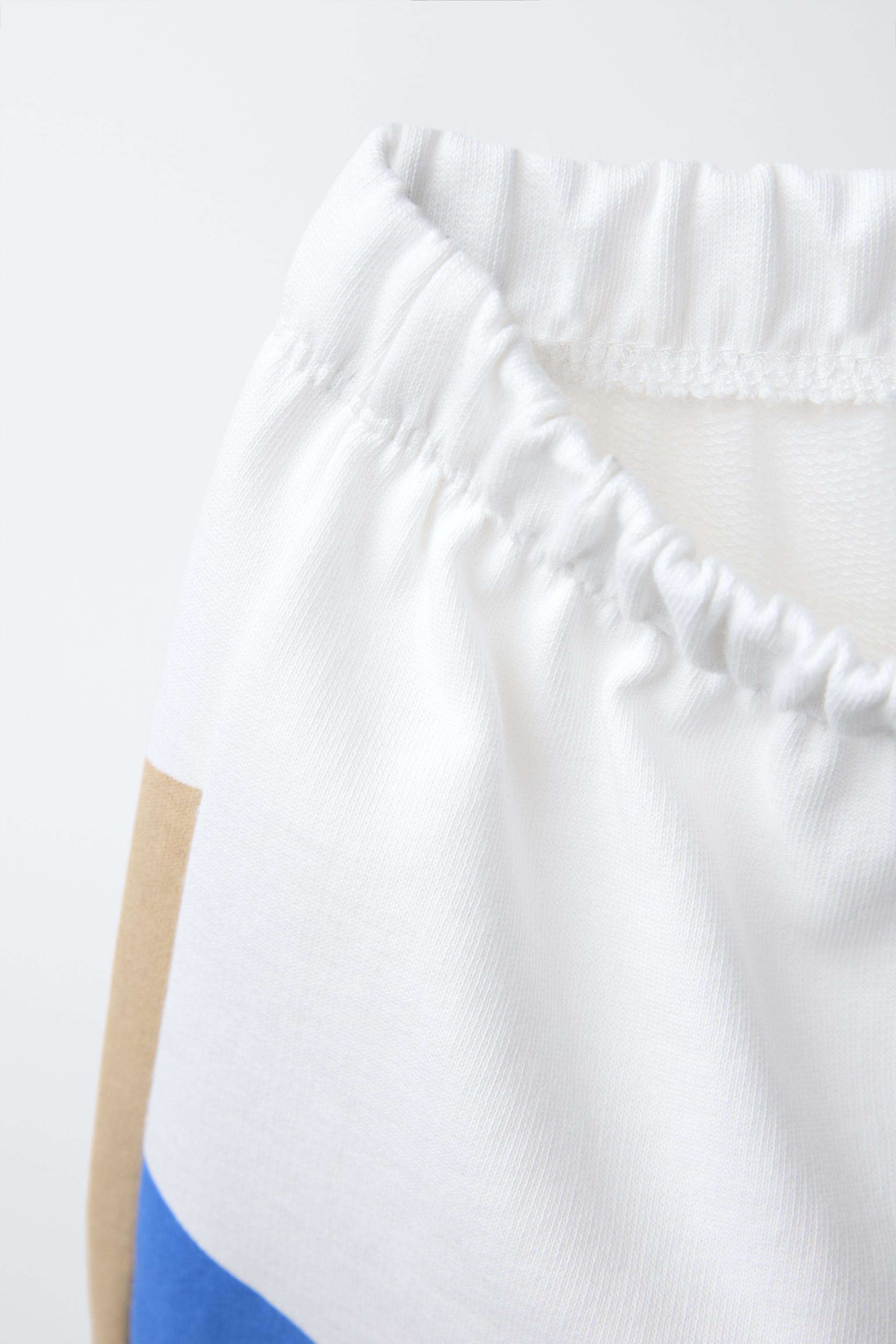 ENSEMBLE DE JOGGING T-SHIRT ET BERMUDA SNOOPY PEANUTS™