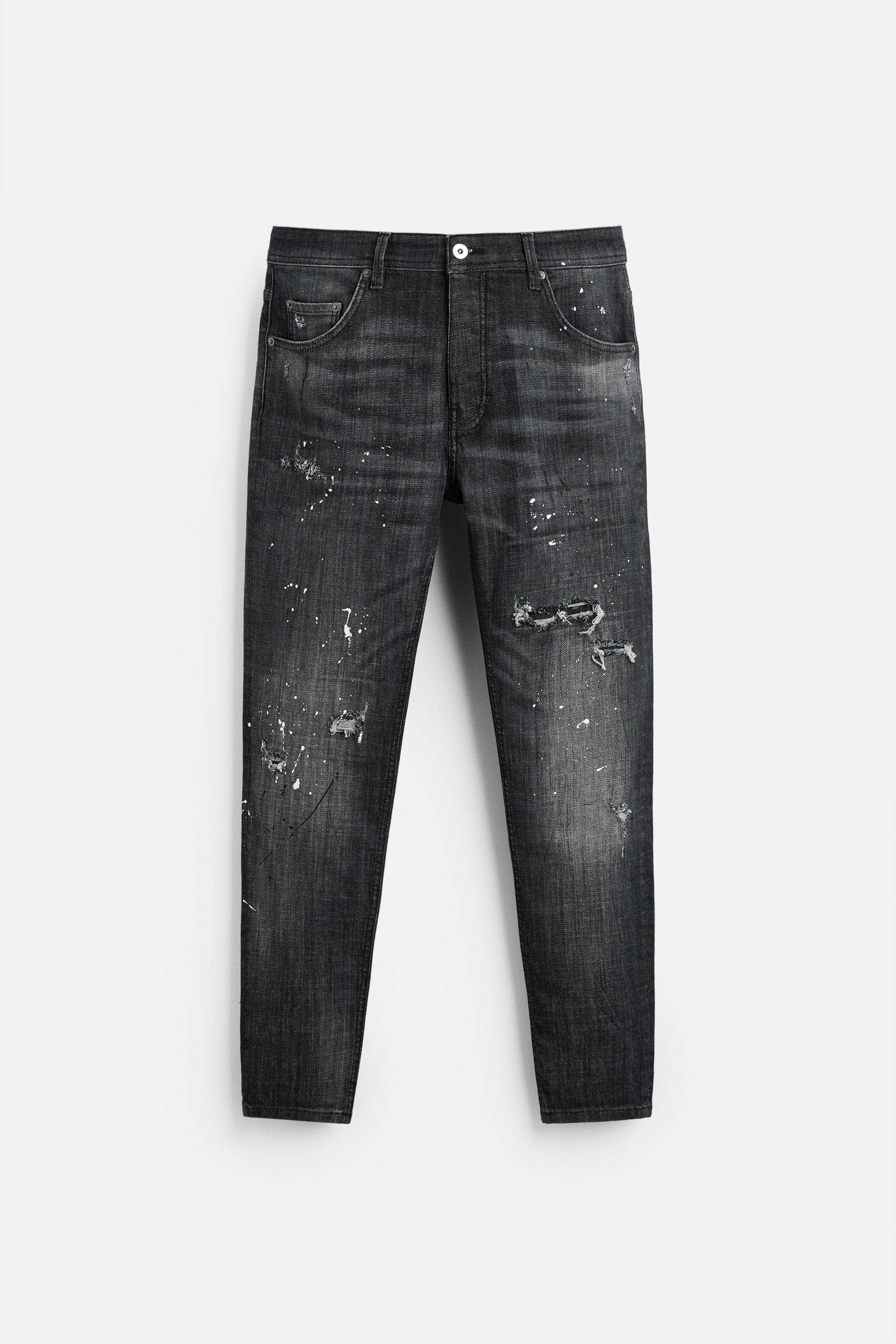 SPLATTERED RIPPED SKINNY JEANS